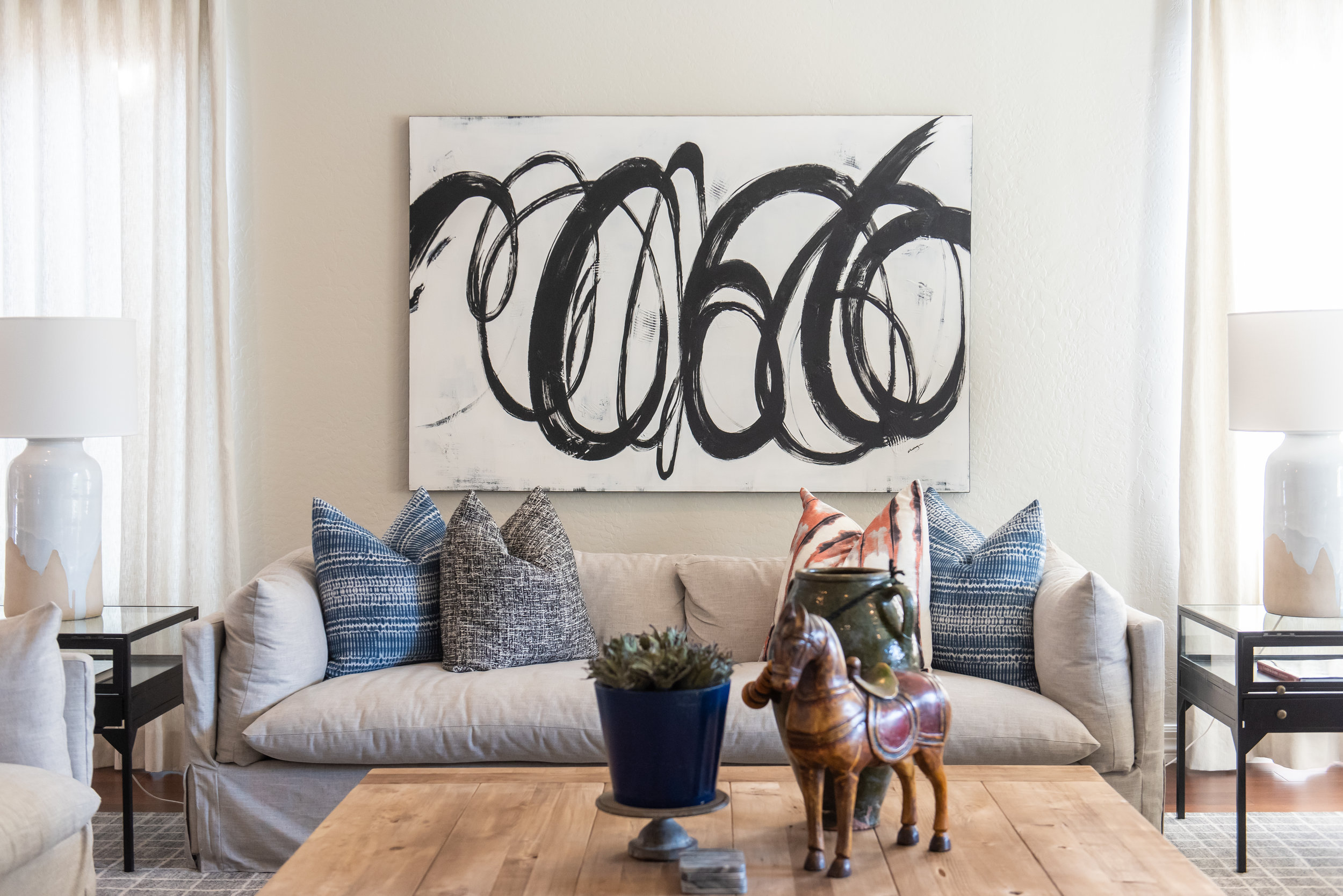 Family Room +couch +abstract-art +wood +coffee-table +accessories .jpg