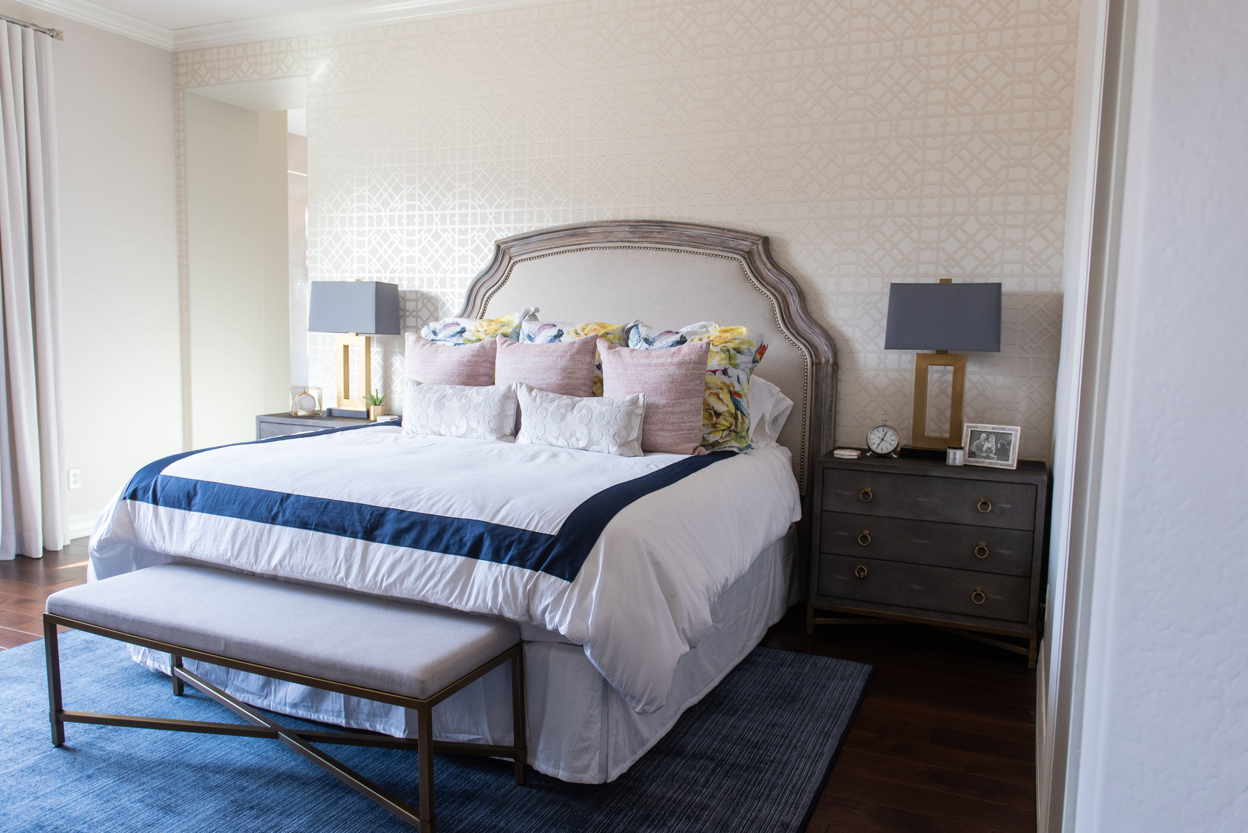 Master bedroom +lamp +nightstand +throw pillows +bedding +wallpaper +headboard +bench +rug.jpg