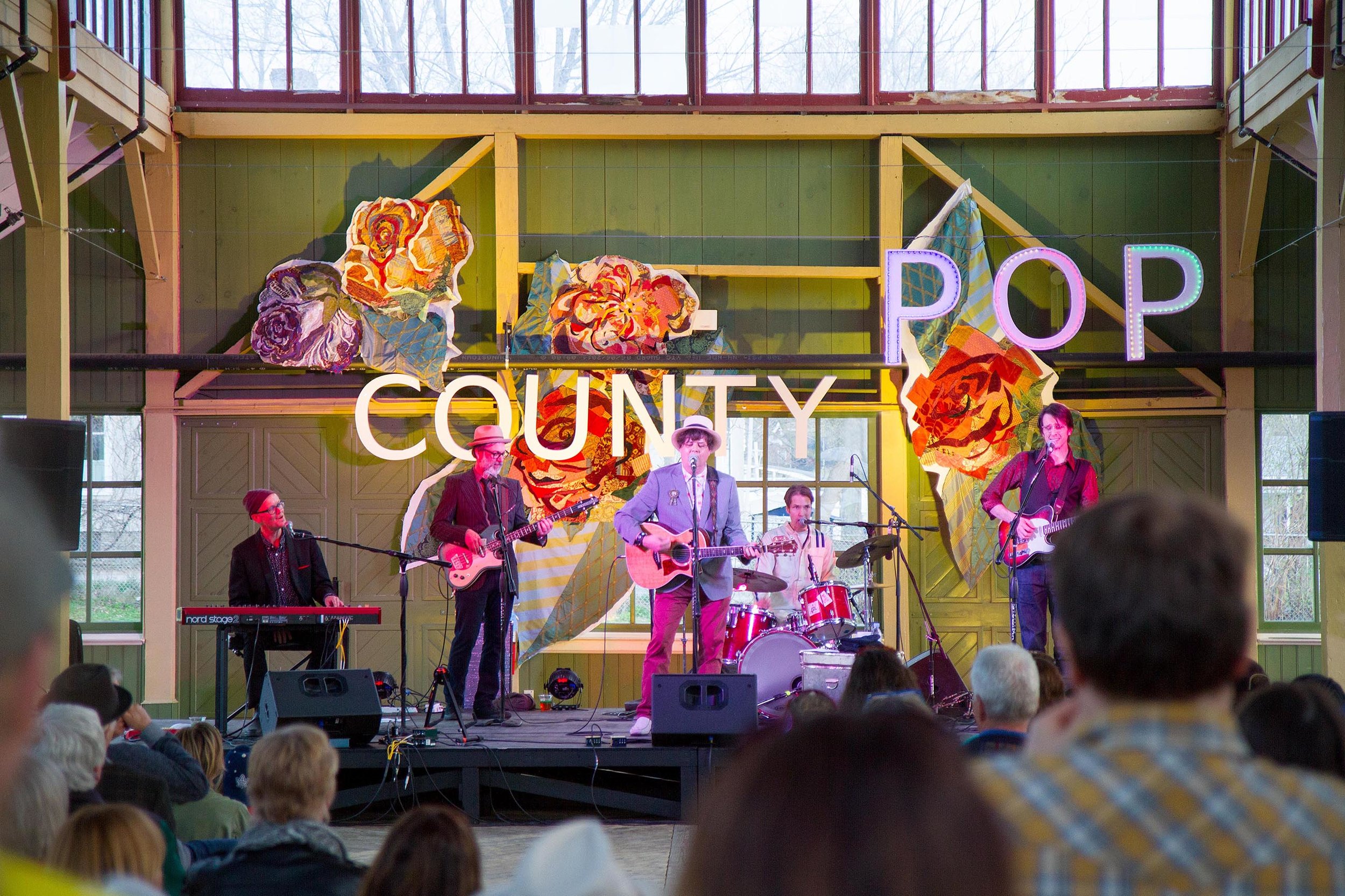 Suendrini's art makes the County Pop 2016 stage really pop!