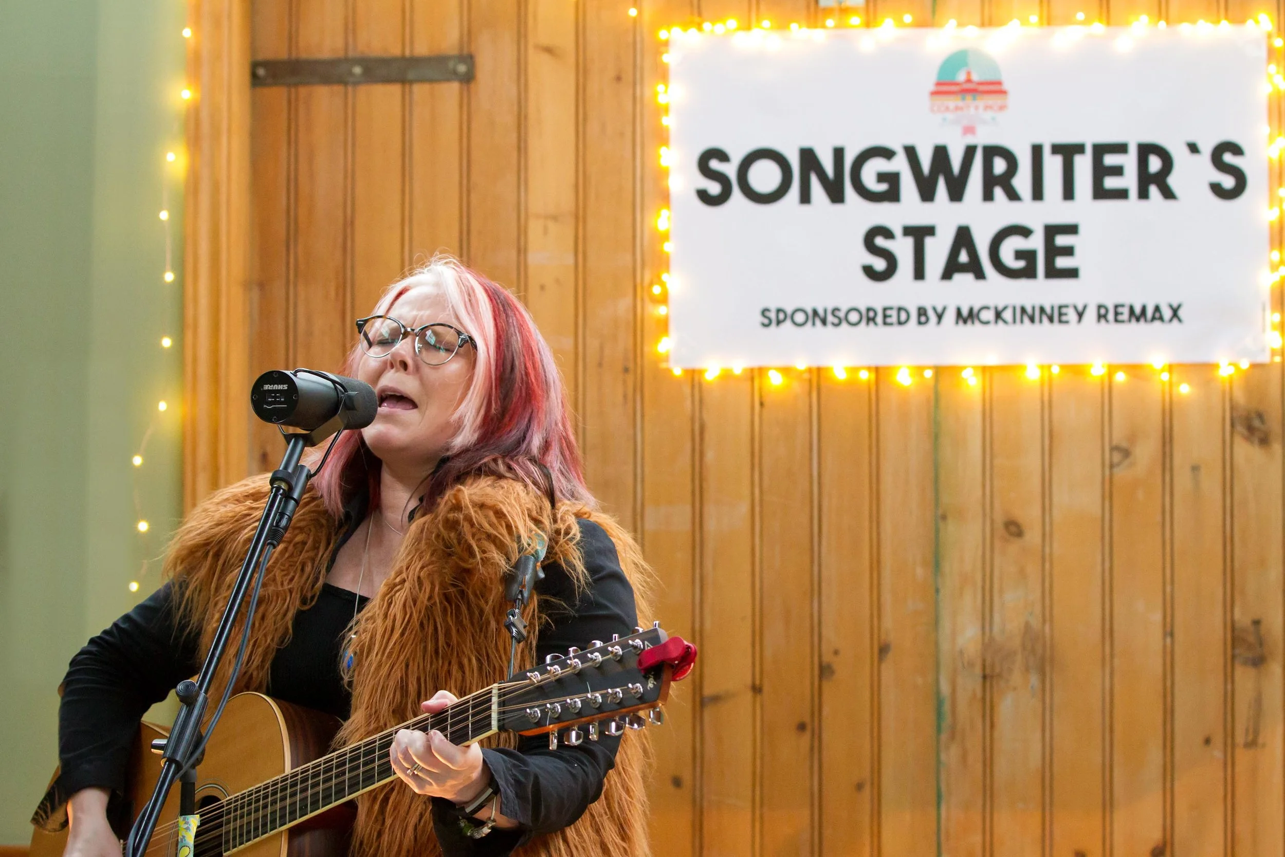 Astrid Young plays the Songwriter's Stage (photo by Bob Ullrich)