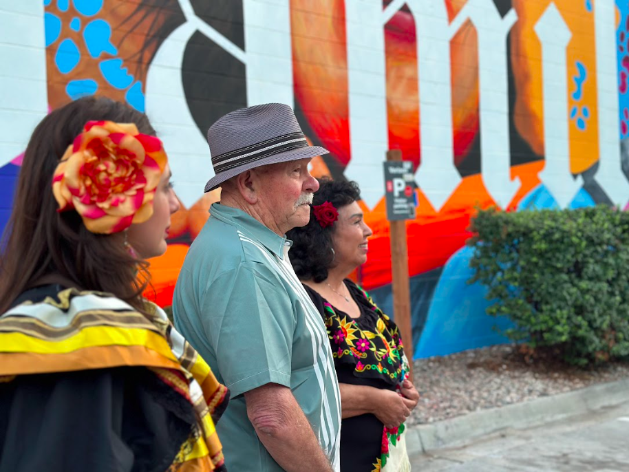 Yadira and Betty standing with Chuck Selano