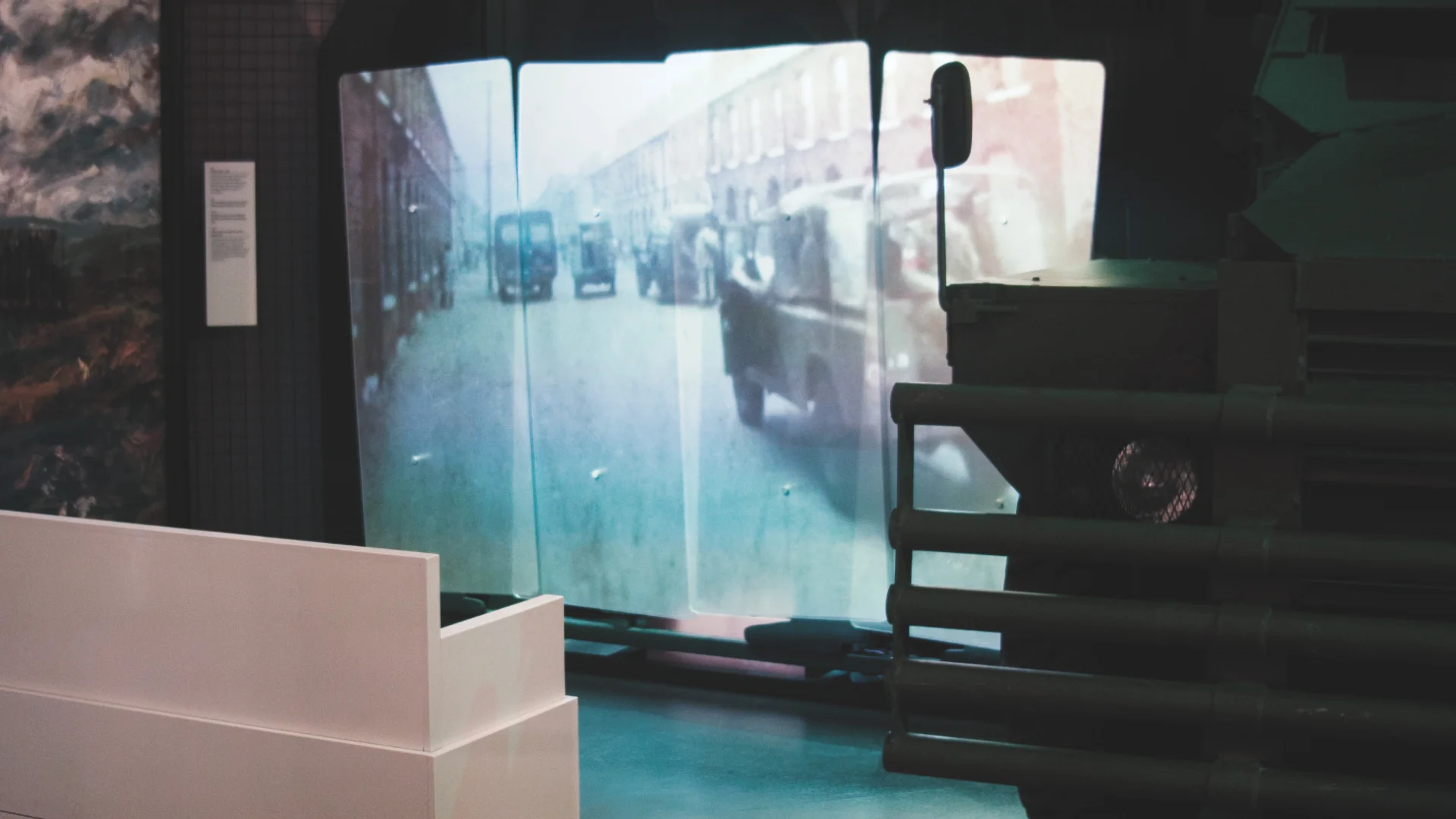The completed look of the projection mapped "Conflict in our streets" video onto perspex riot shields in the Northern Ireland exhibition space.
