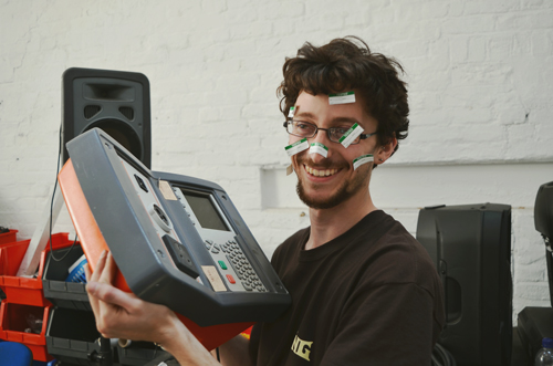   A moment of fun at the warehouse! Dubbed in the company as ‘’PAT tester extraordinaire’’, Josh celebrates finishing testing of over 3000 electrical items and cables.  