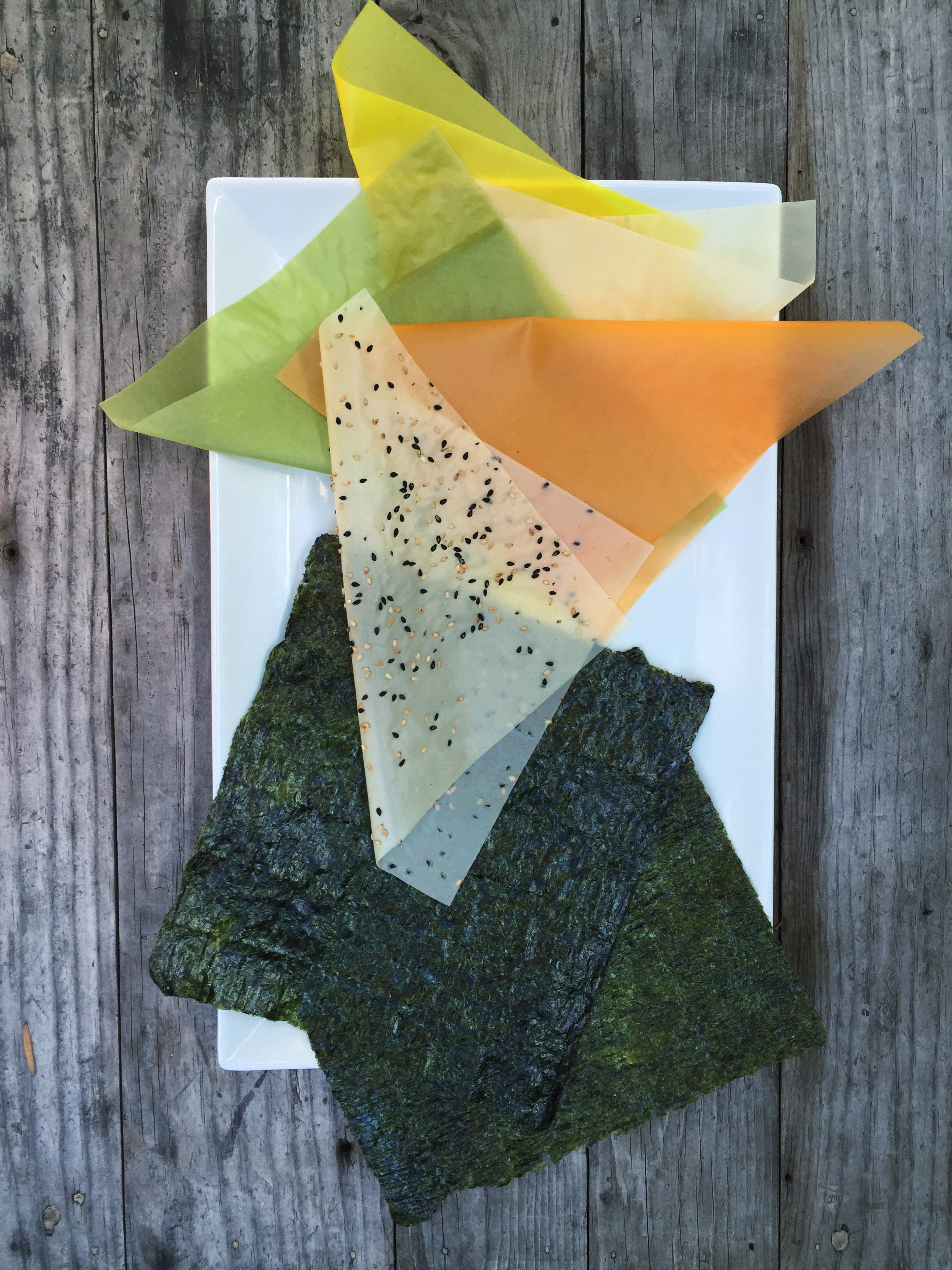 Food Origami! Soy paper, colored naturally with tumeric, paprika and spinach & Nori aka seaweed wrap.