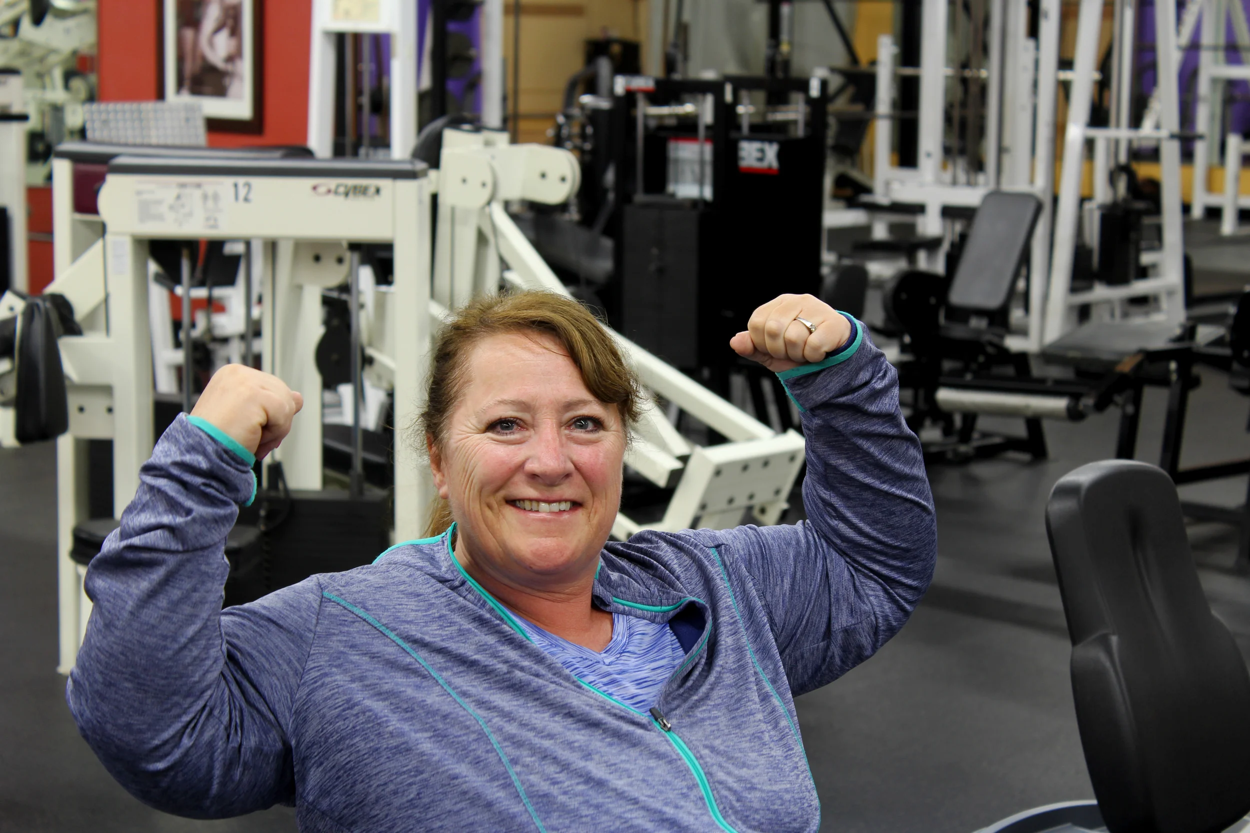 Sherri Pipkin sits on the Precor bicycle for her daily, early-morning workout at Mt Si Sports. 