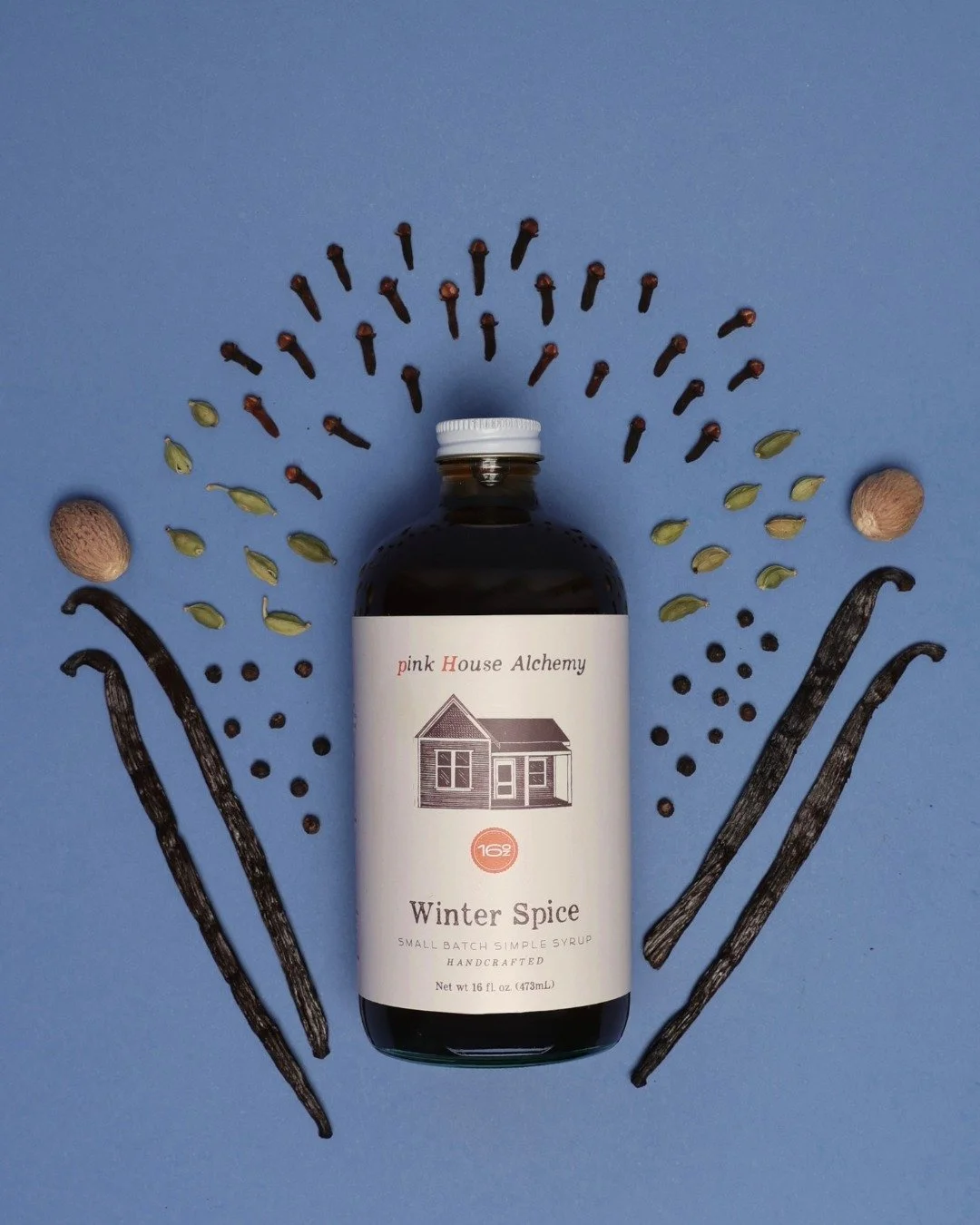 Winter Spice is everything nice.

Cherry wood smoked cloves, cardamom, peppercorns, nutmeg &amp; vanilla beans to warm your drinks, recipes, and the chilly days.
This seasonal syrup is bold but versatile; spiced but velvety; sweet but nuanced &amp; s