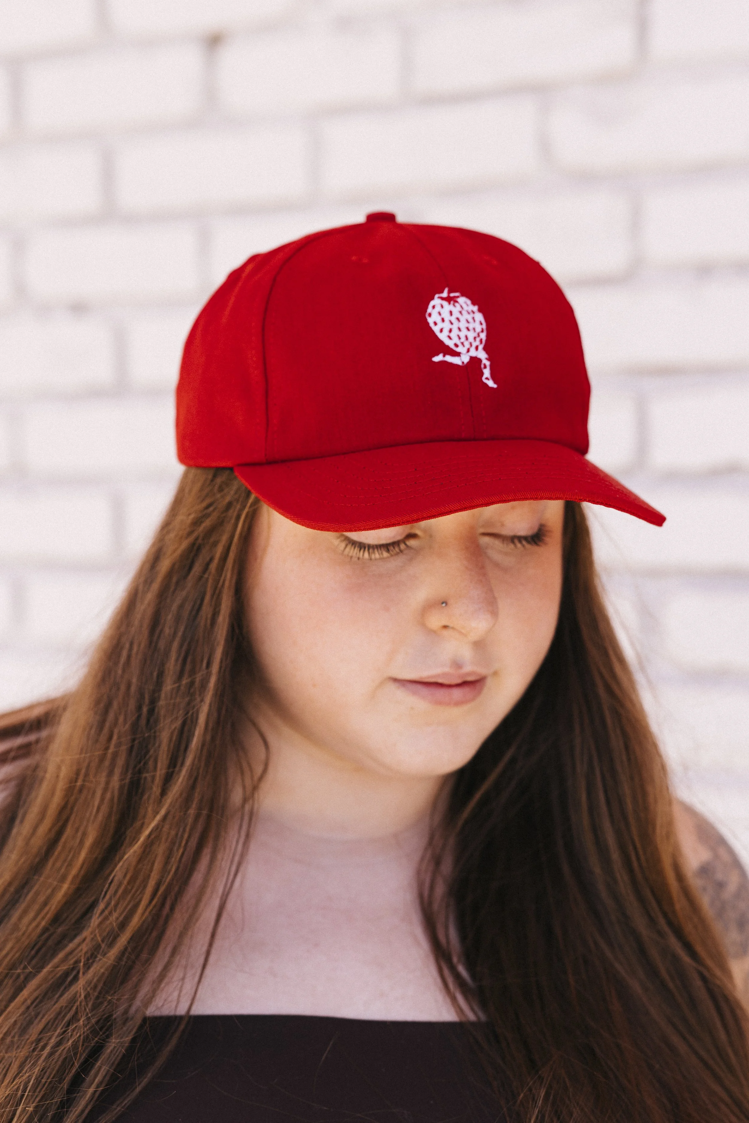 Strawberry_Ruby_June_embroidered_hat_model.jpg