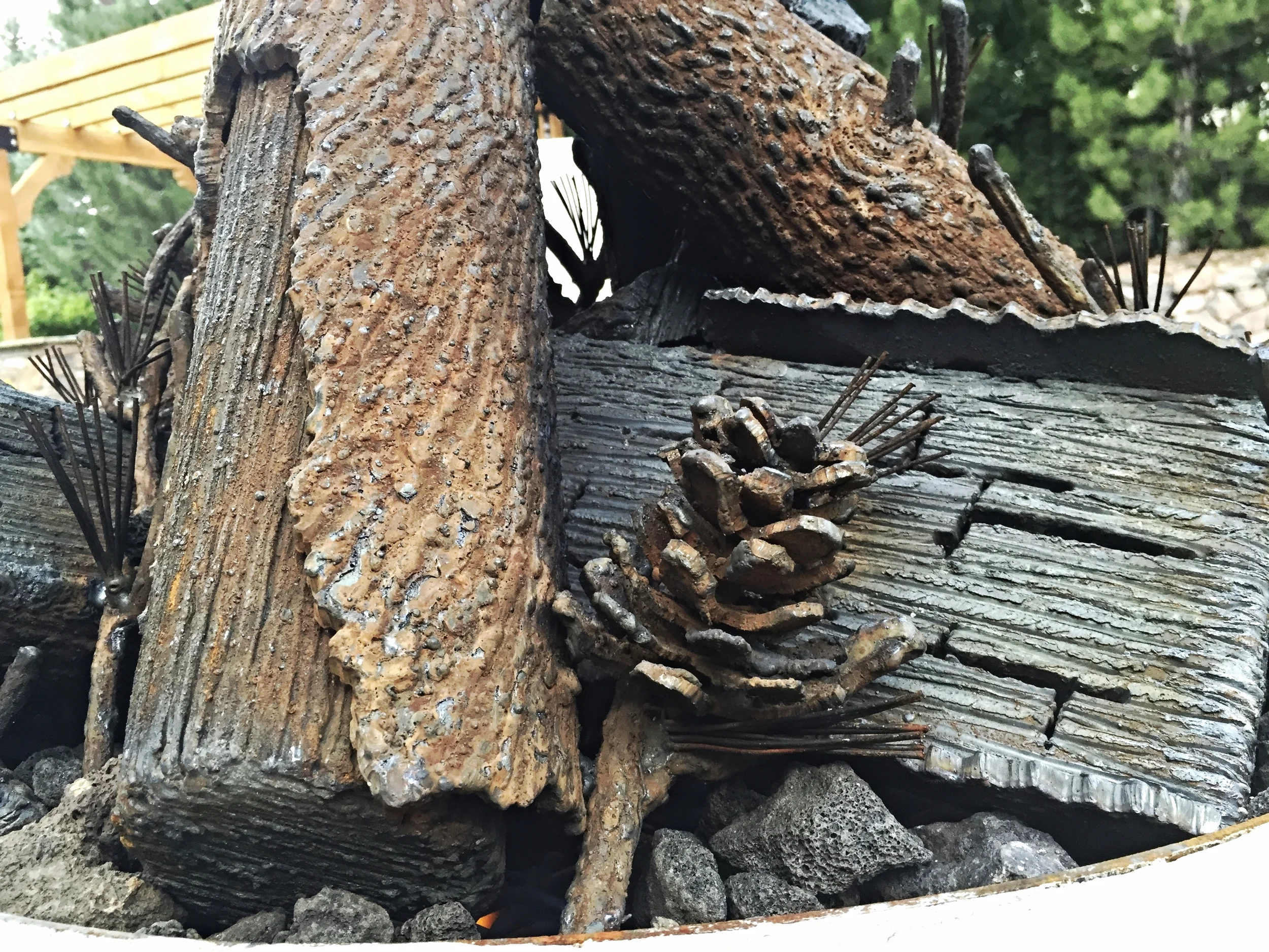 Peeled bark, wood grain, split logs and pinecones are some of the details included in a Custom Luxury.