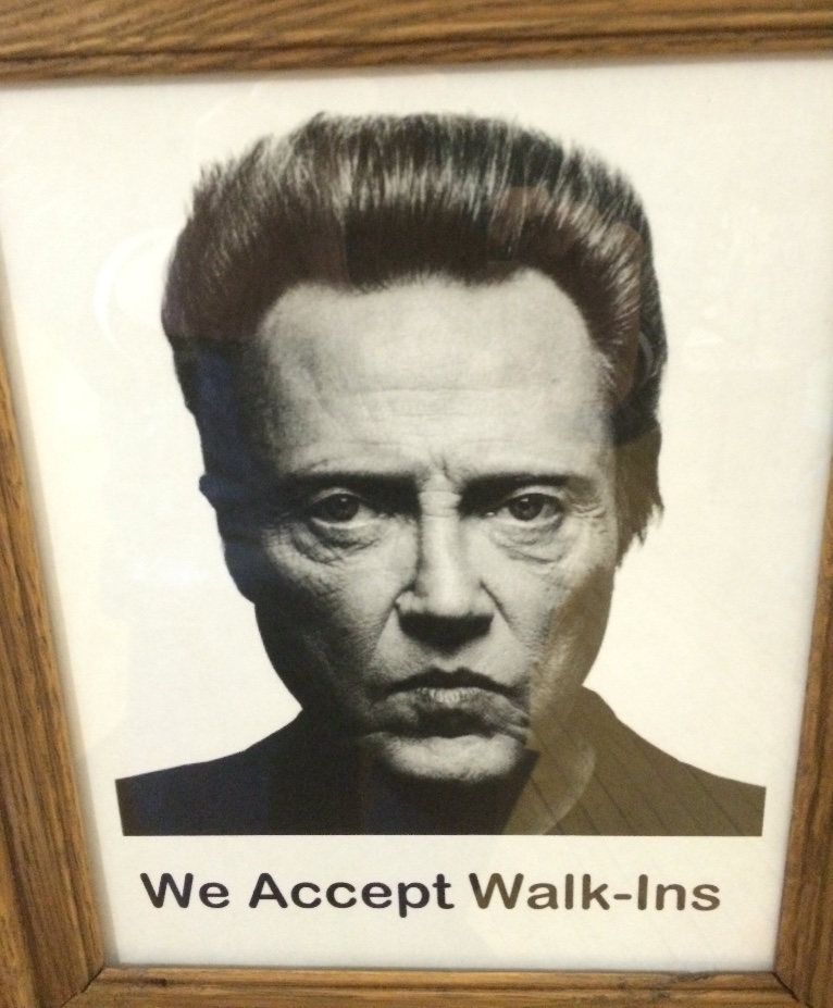 Sign in a barber shop, Grand Rapids, MN.