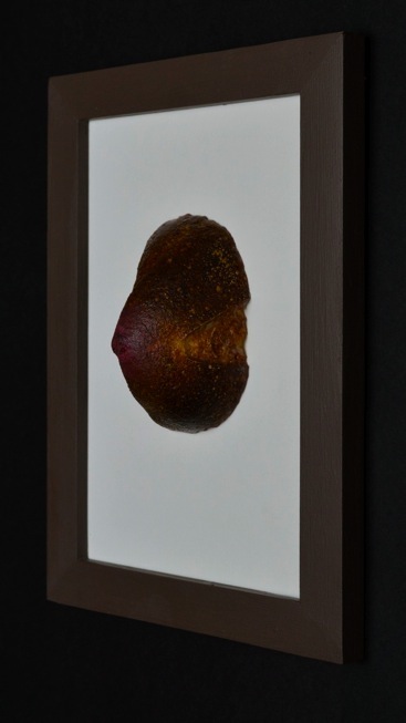 Breast. H: 8” Encaustic on Bread.