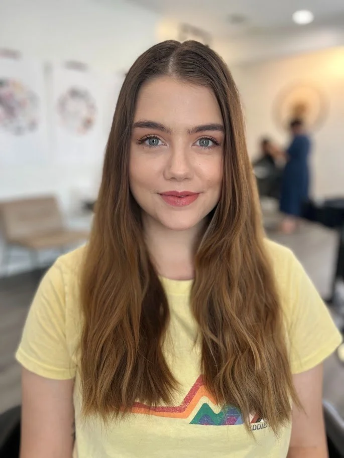 Before photo of a Siren Curl Studio client with unshaped wavy hair prior to a professional wavy haircut.