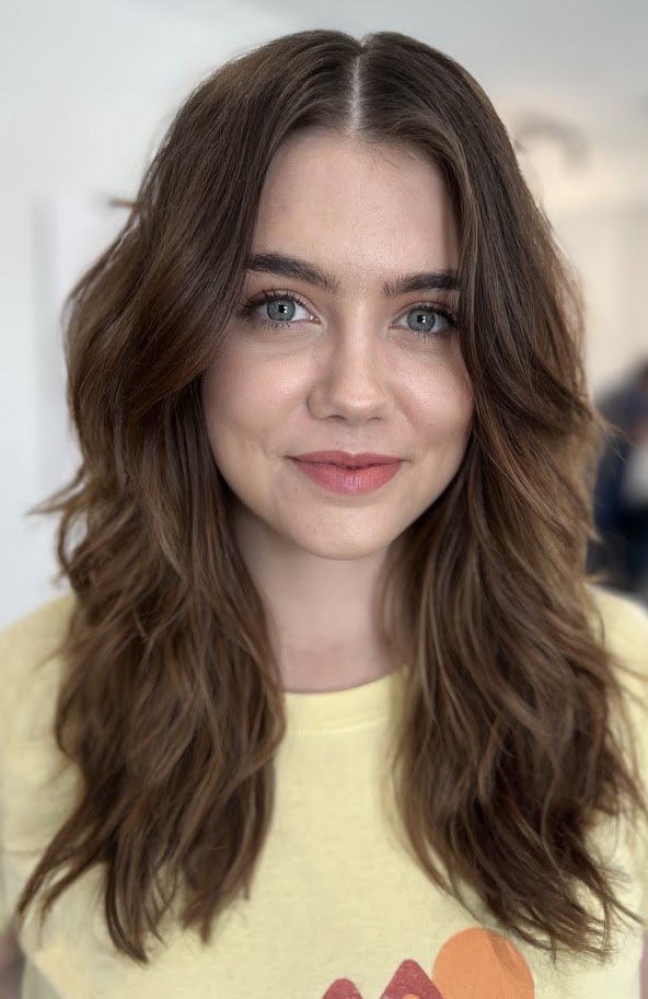 Siren haircut after photo at Siren showcasing healthy waves with natural flow.