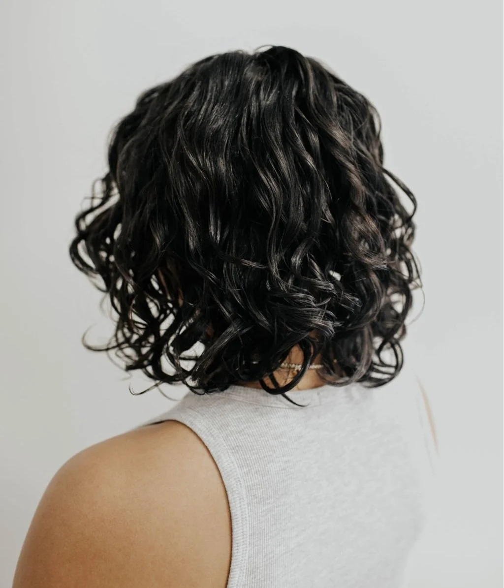 After result of a Siren Curl Session highlighting healthy, shaped curls with enhanced definition and shine