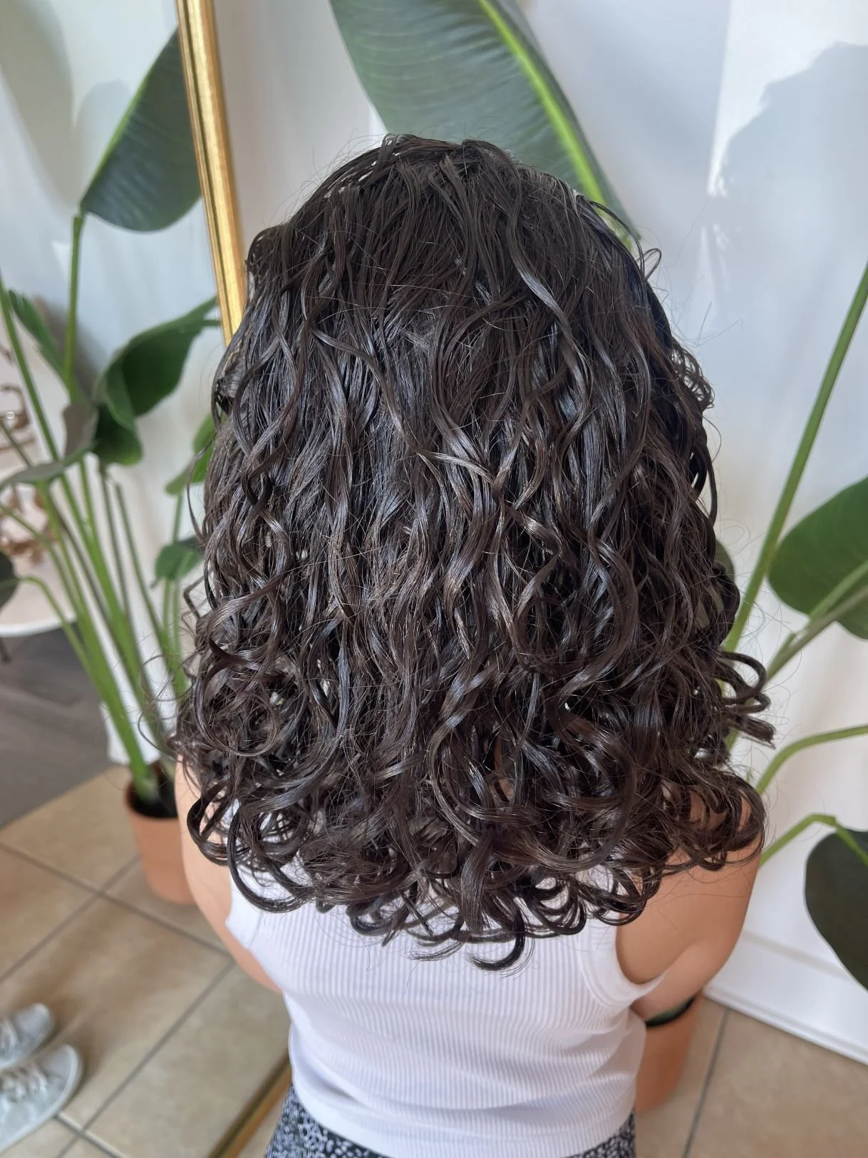 After result of a Siren Curl Session highlighting healthy, shaped curls with enhanced definition and shine.