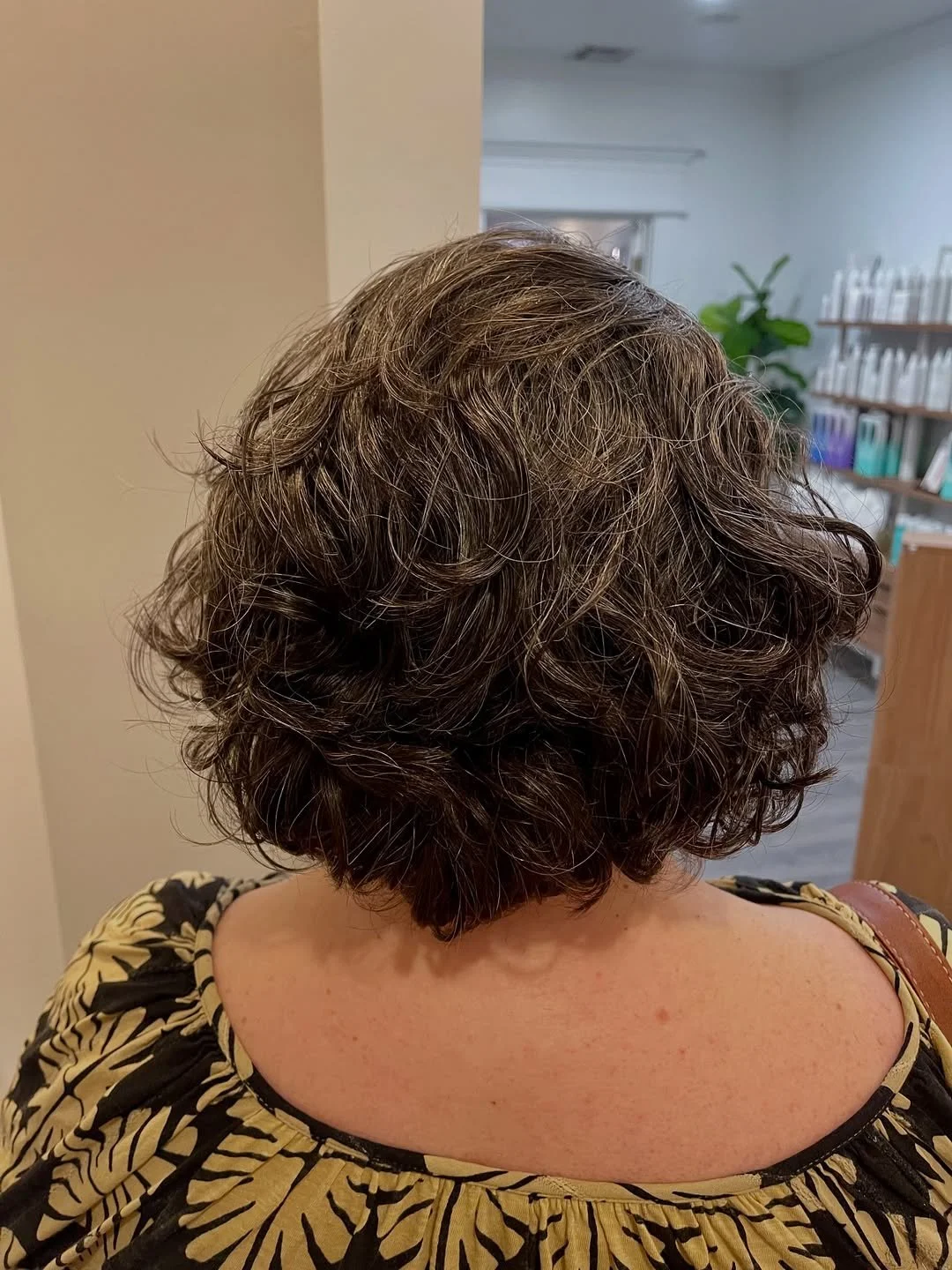 After photo of a Siren Curl Session revealing soft, touchable curls with long-lasting definition.