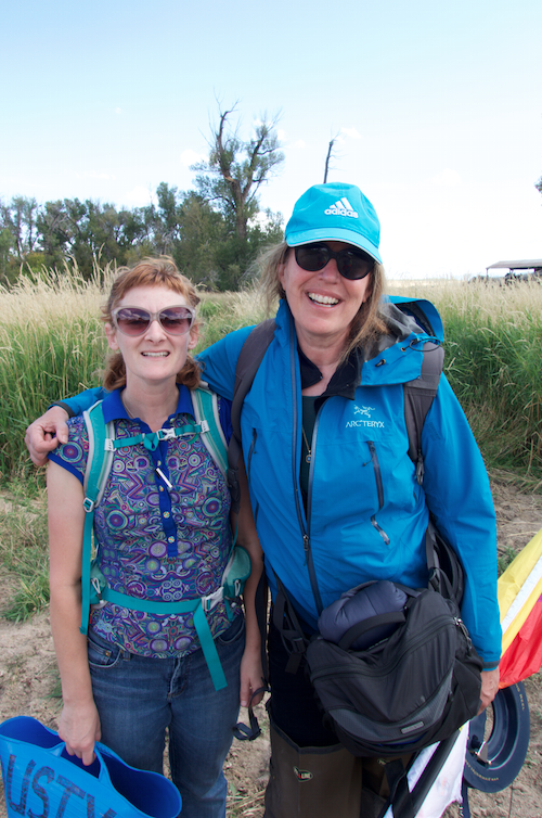In the field: Necole with Dusty bucket and Tama with her kite.