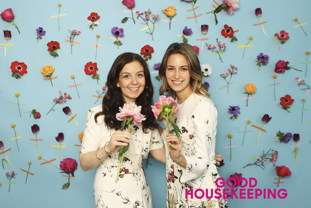 Our Sky Blue Backdrop spruced up by a local florist.