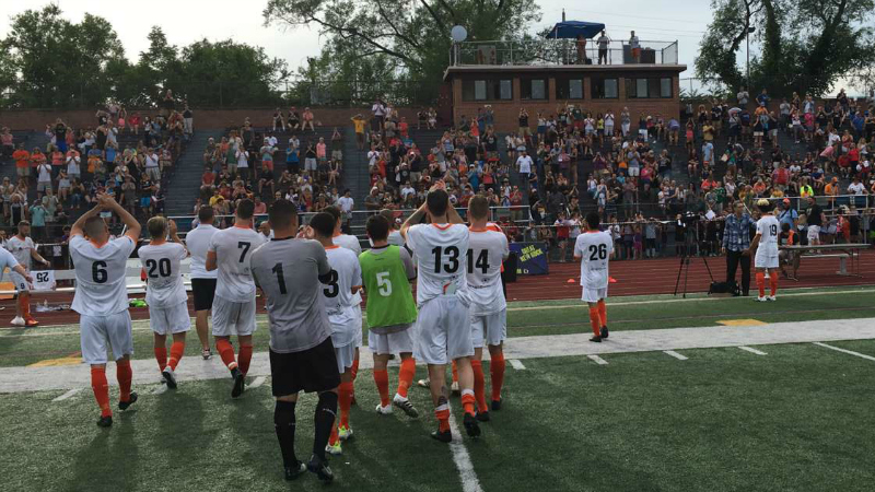 Stockade players applaud the record home crowd after Sunday's win (photo by Nick Hoffay)