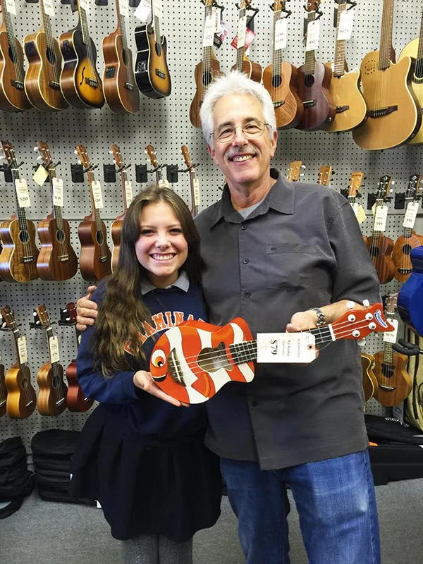 Heartstringz founder Natalie with George Kaye and a sweet clown fish ukulele!