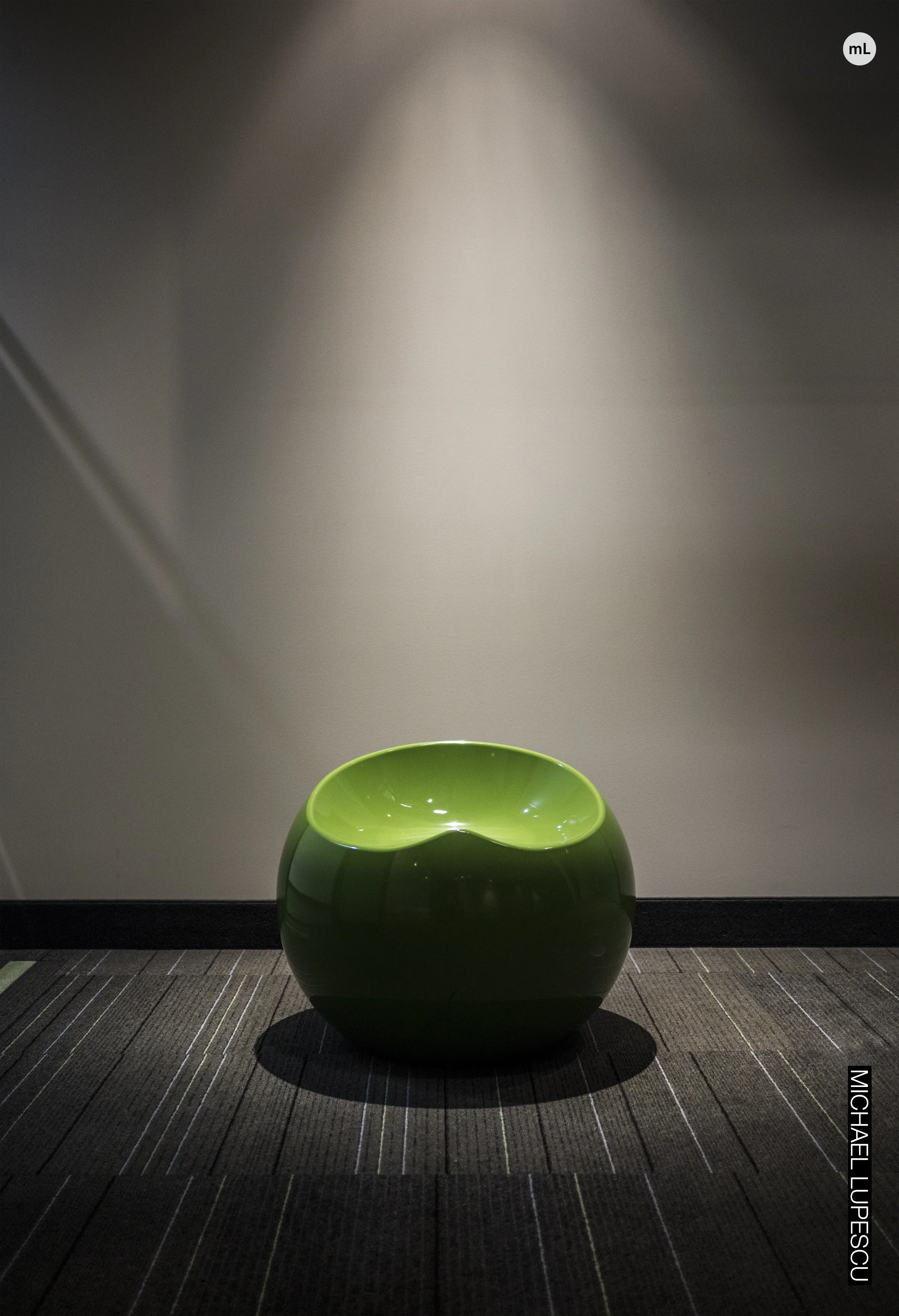The green chair under the steps