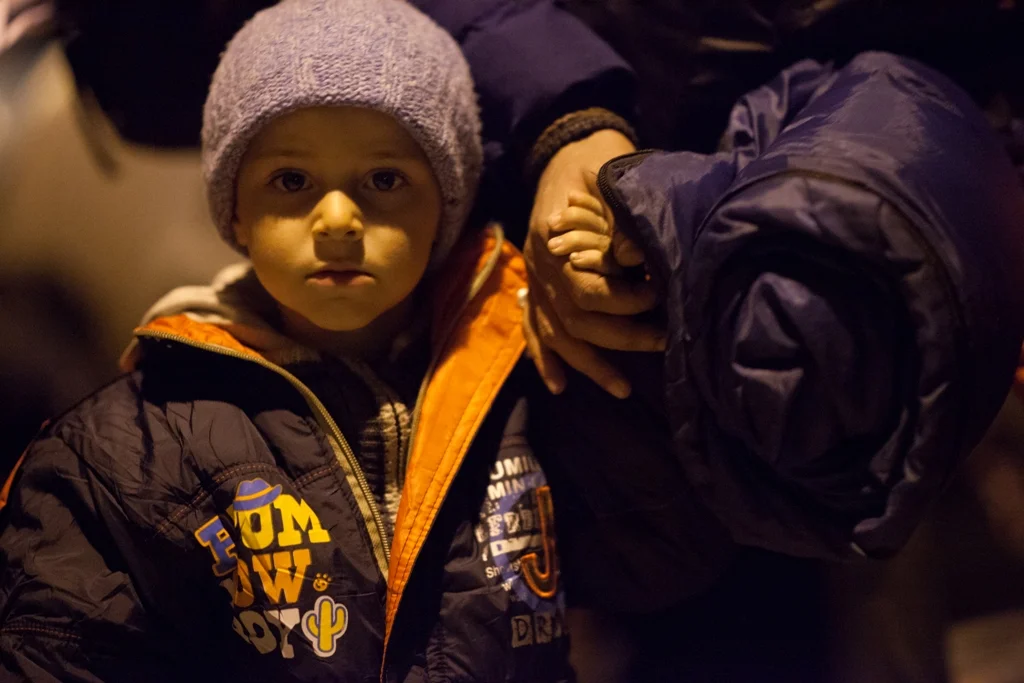 Syrian child crossing the Serbian border.