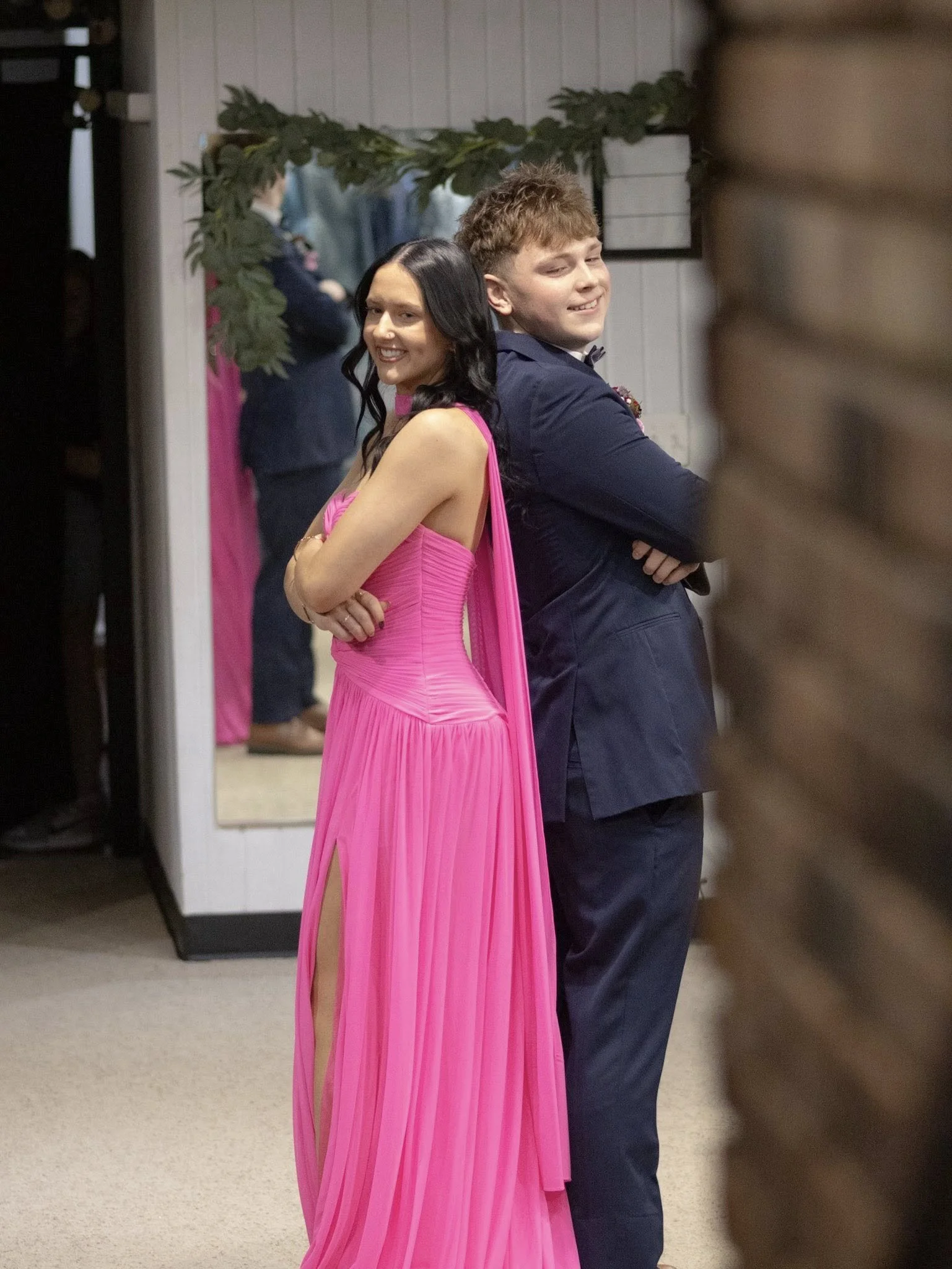 girls wearing prom dresses