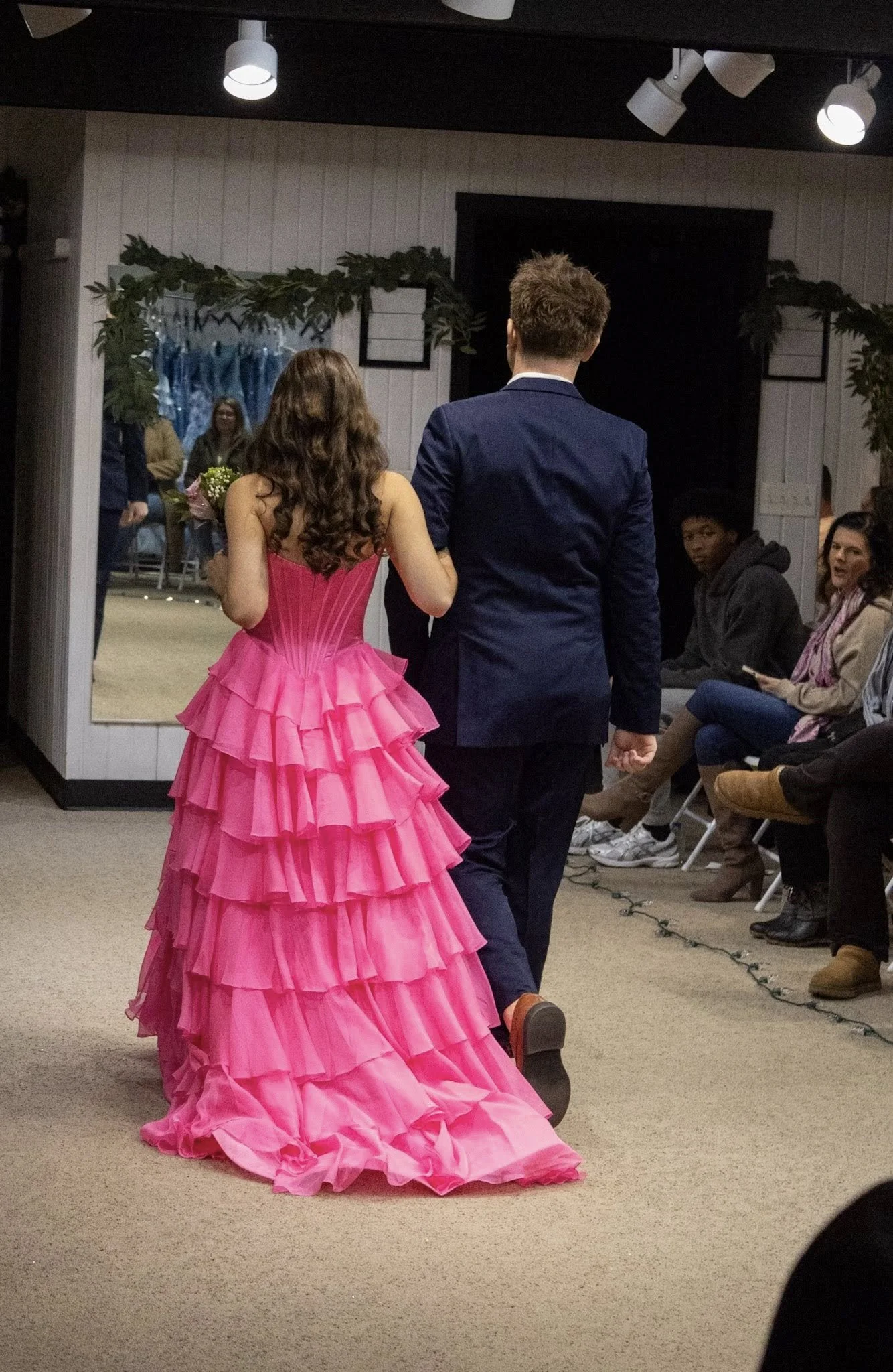 girls wearing prom dresses