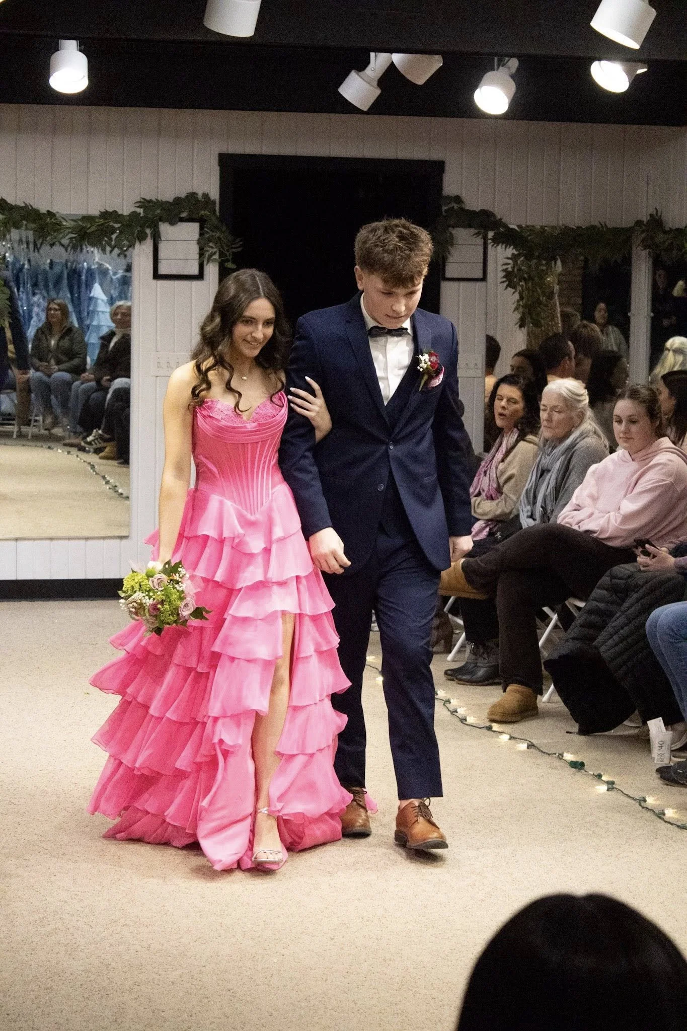 girls wearing prom dresses