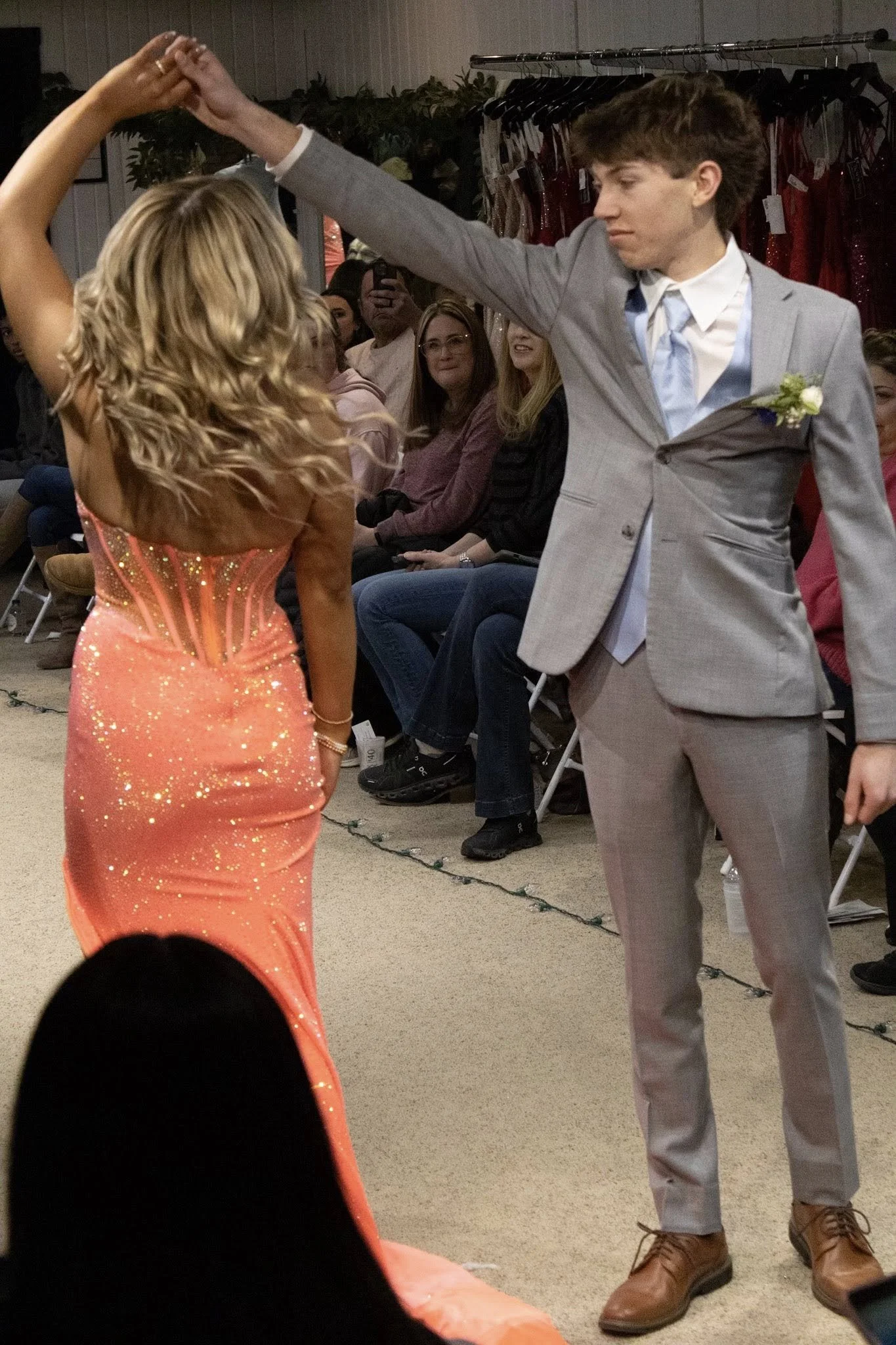 girls wearing prom dresses