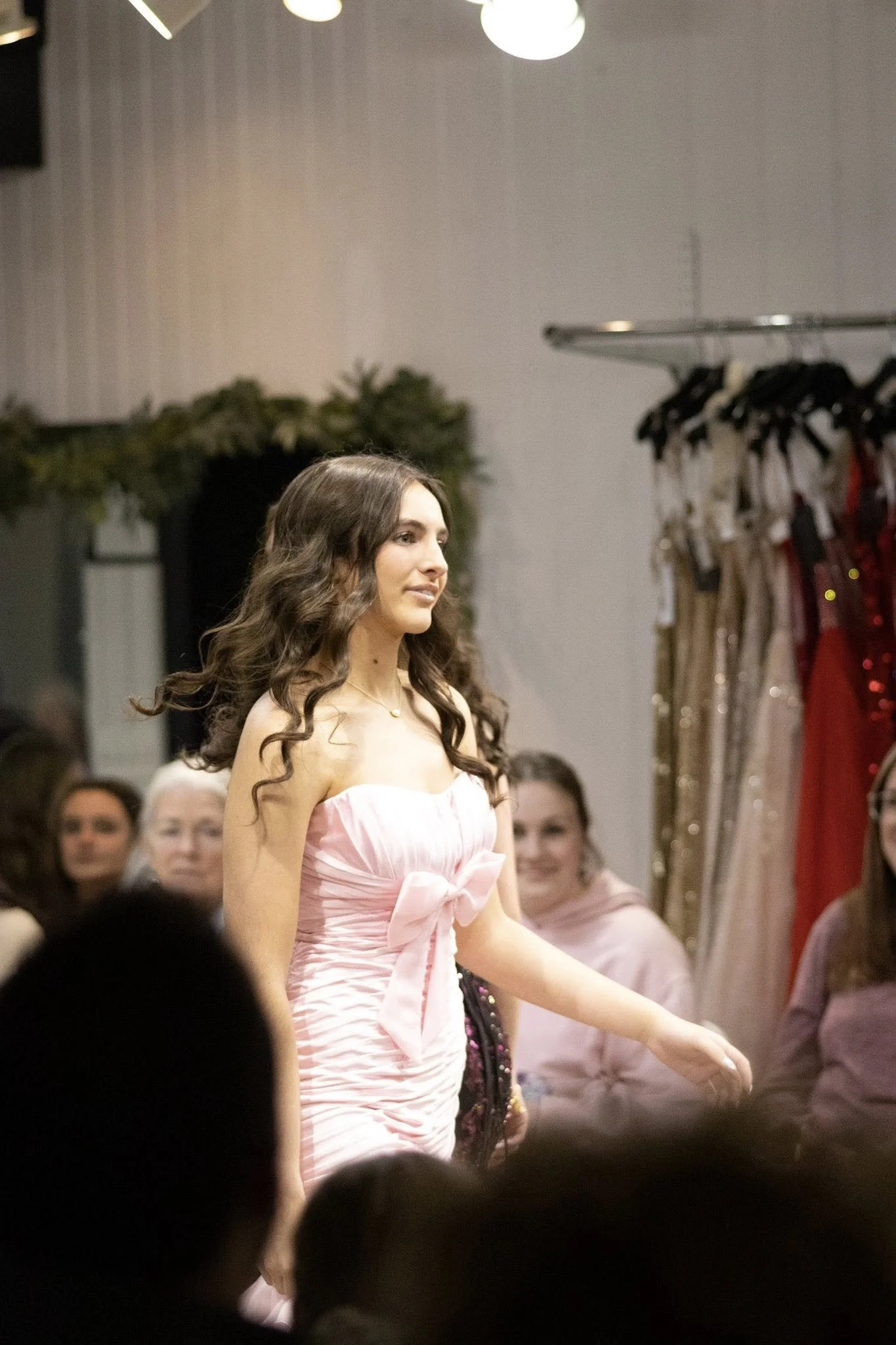 girls wearing prom dresses