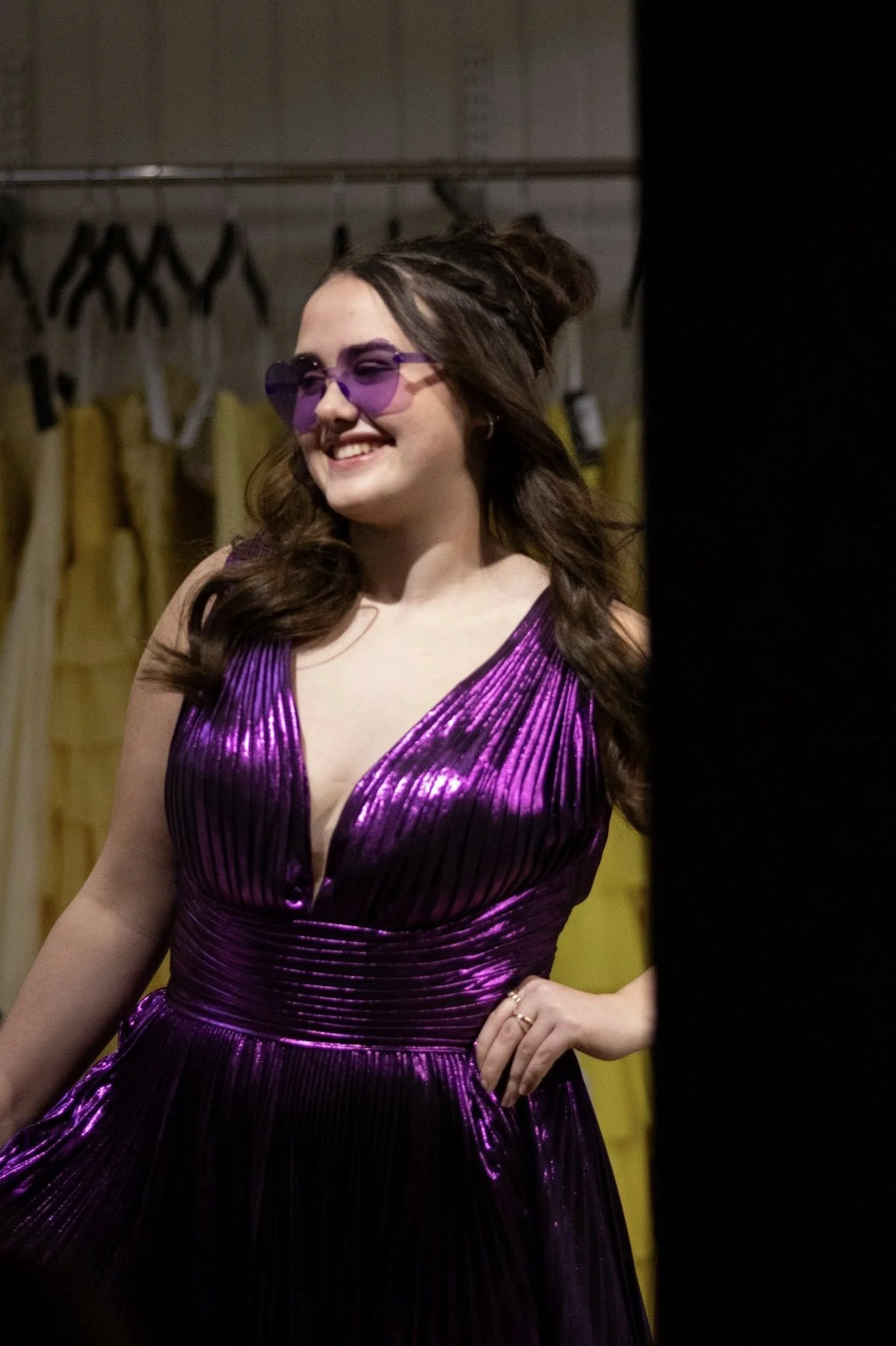 girls wearing prom dresses