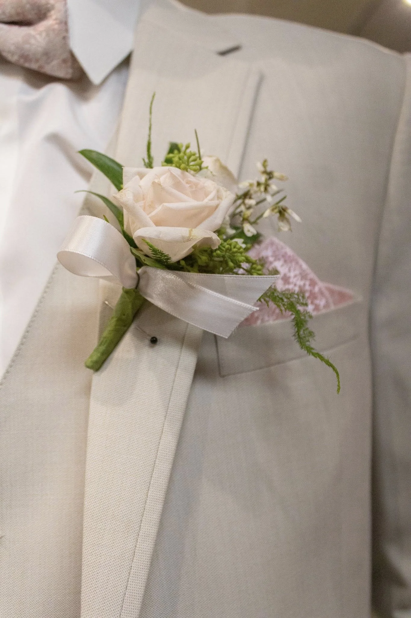 flowers on tuxedo jacket