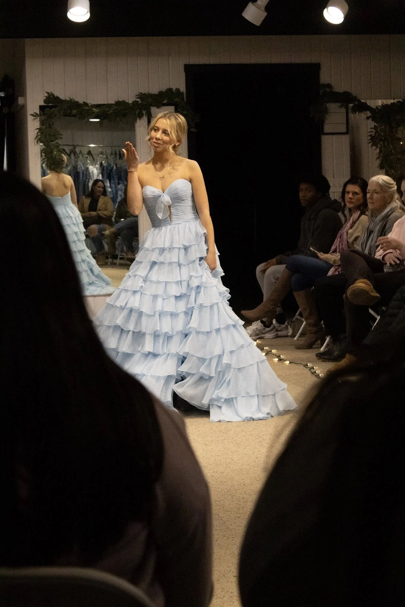 girls wearing prom dresses