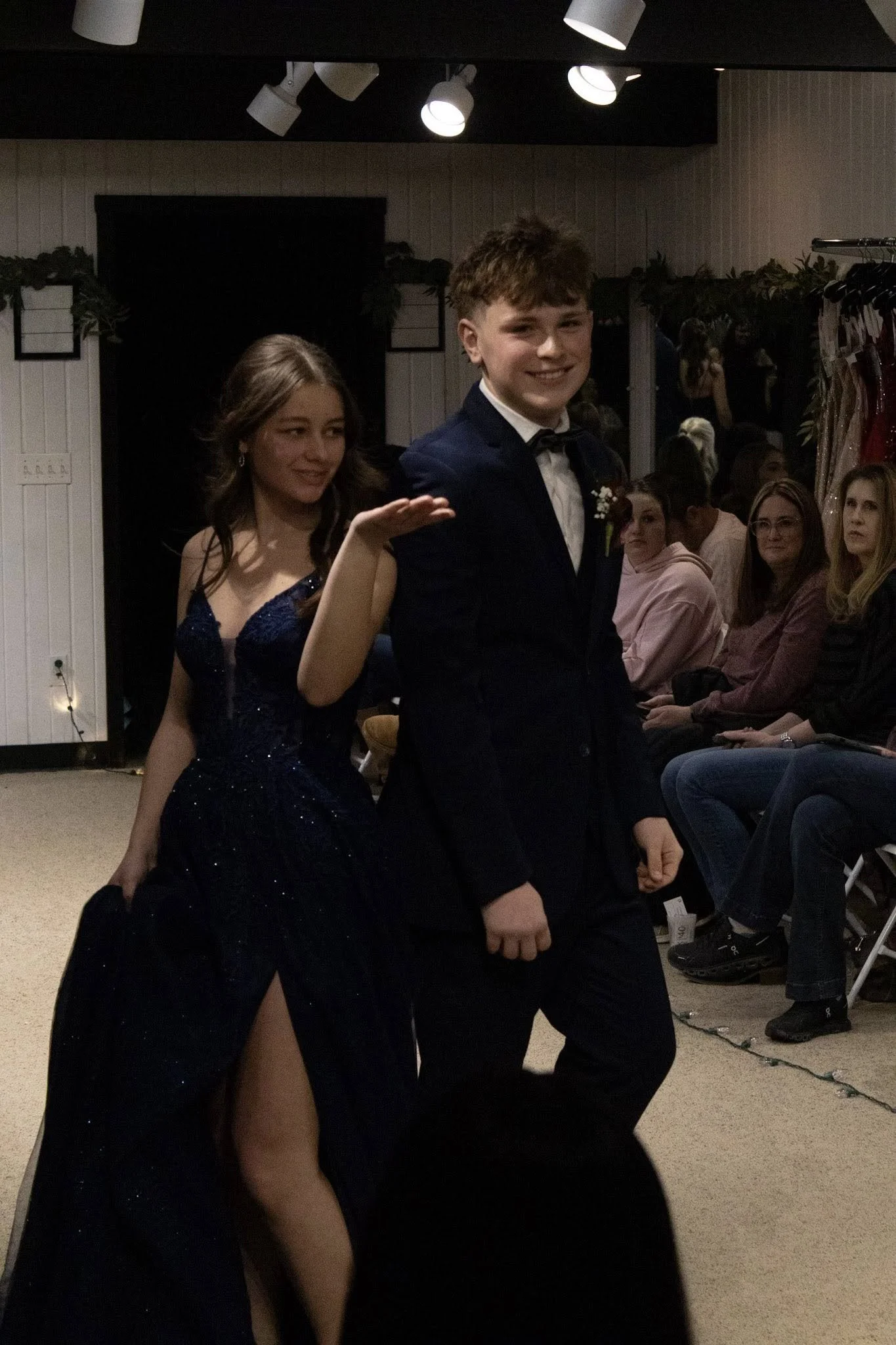 girls wearing prom dresses