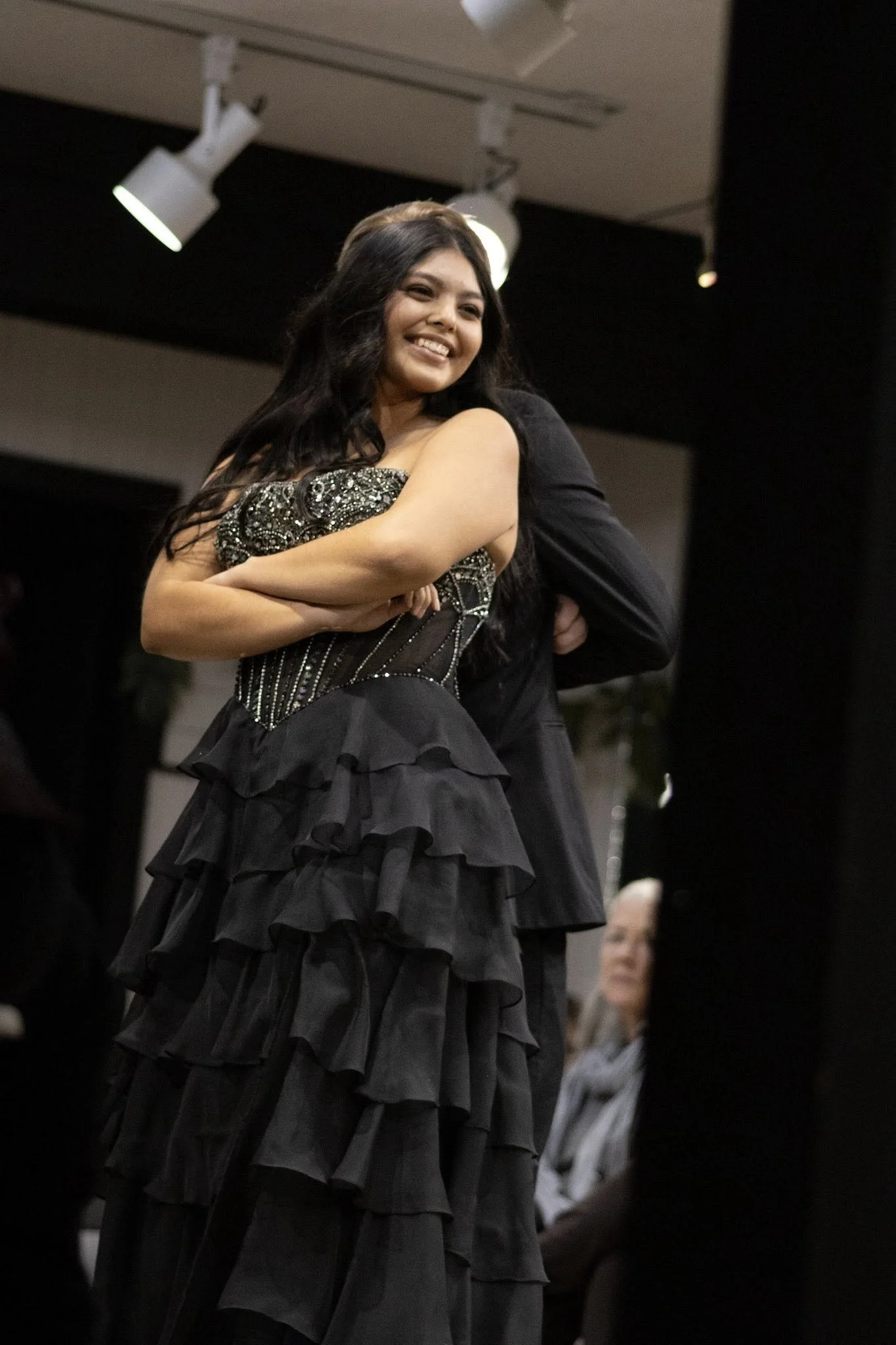 girls wearing prom dresses