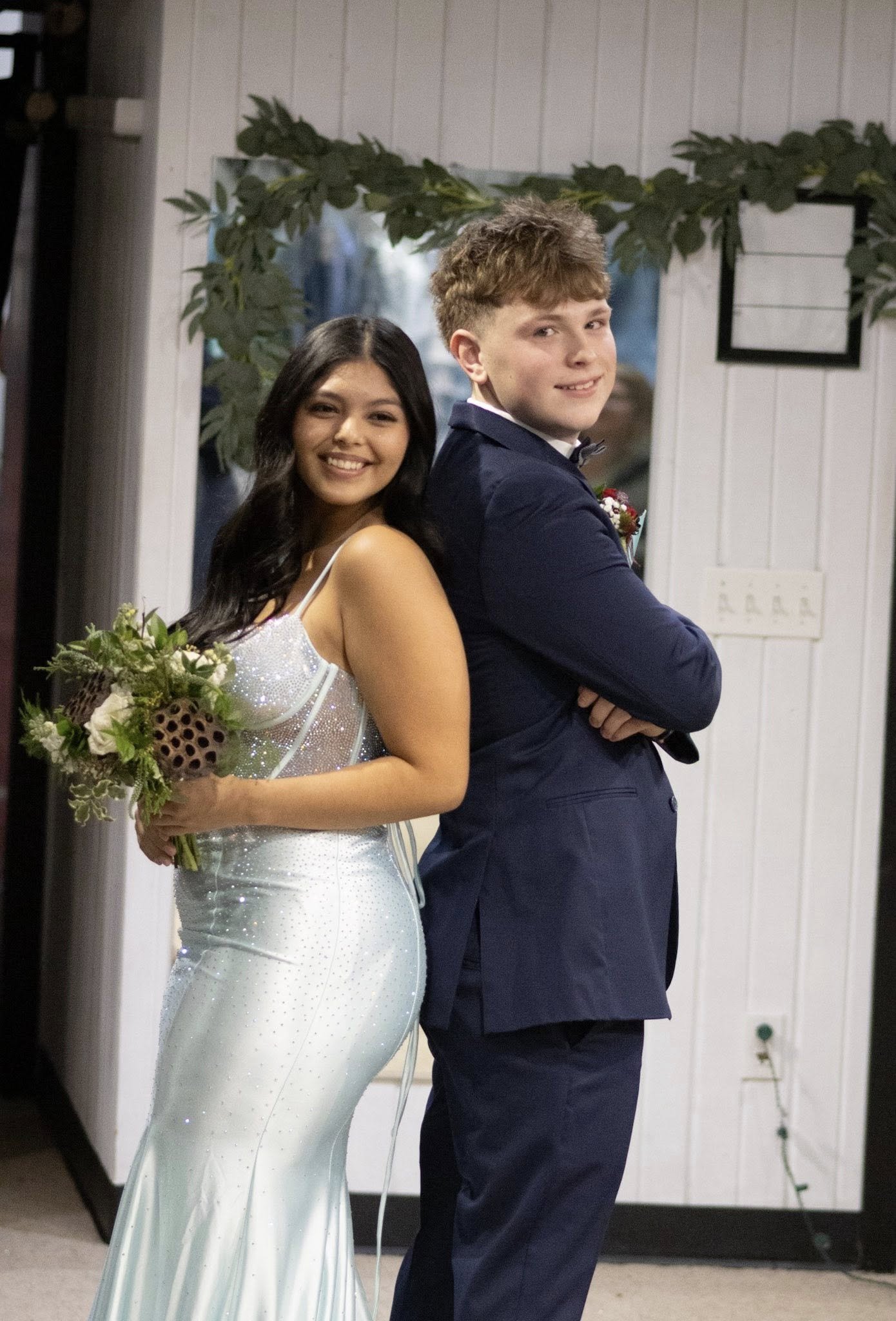 girls wearing prom dresses