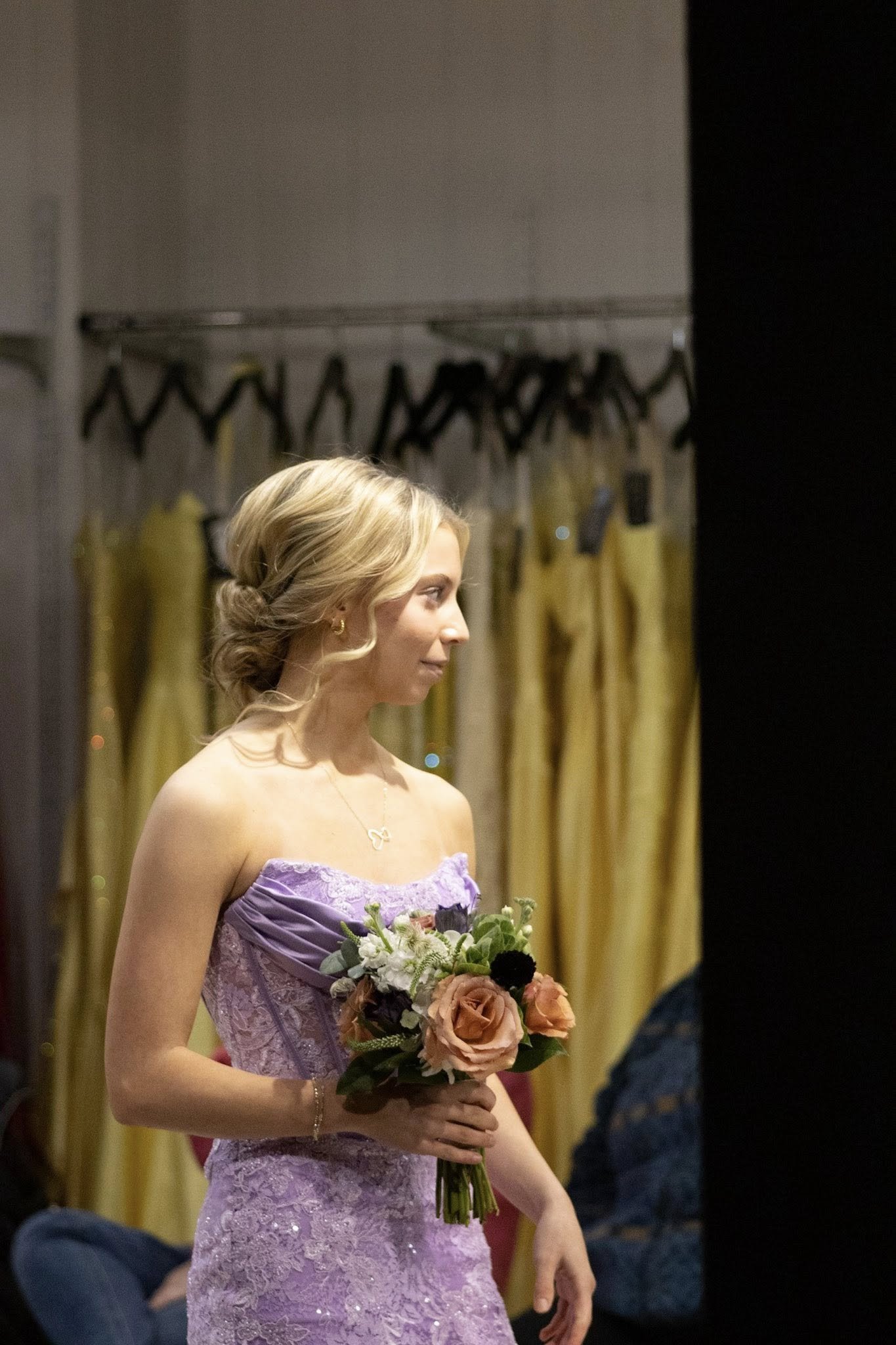 girls wearing prom dresses