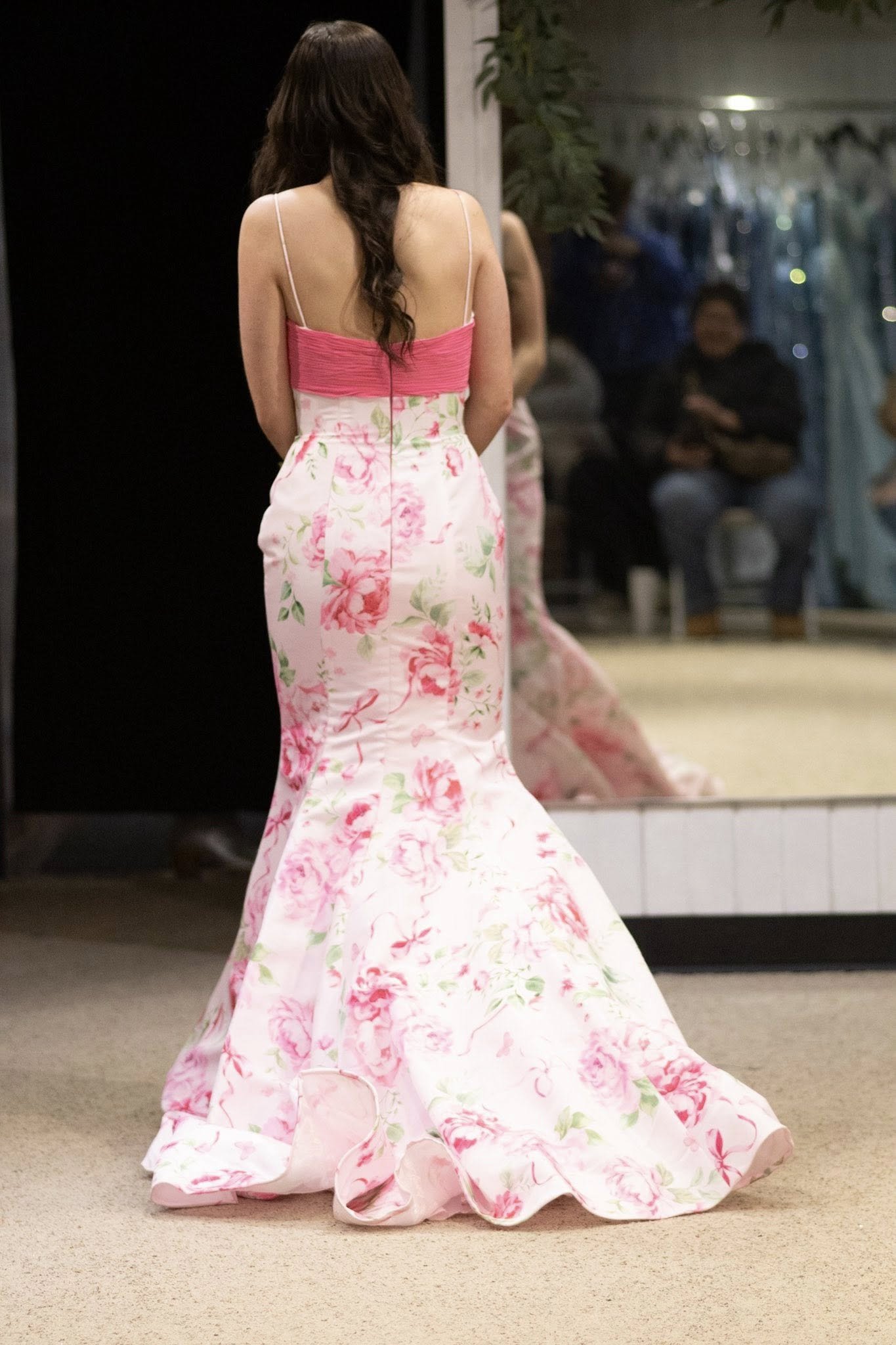 girls wearing prom dresses