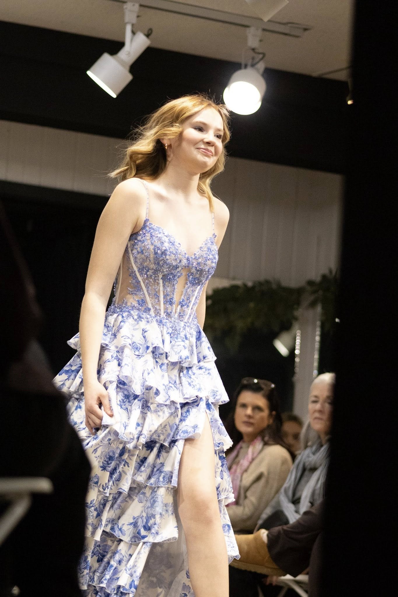 girls wearing prom dresses