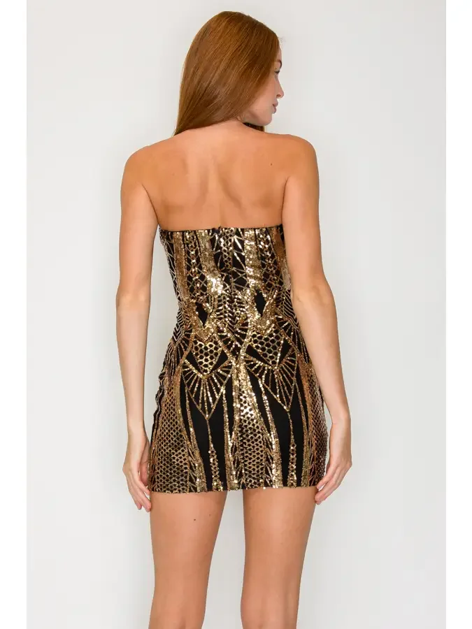 girl in black and gold dress