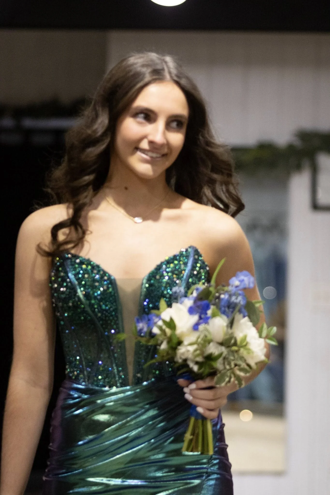 girls wearing prom dresses