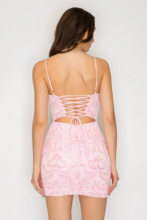 woman wearing short pink dress