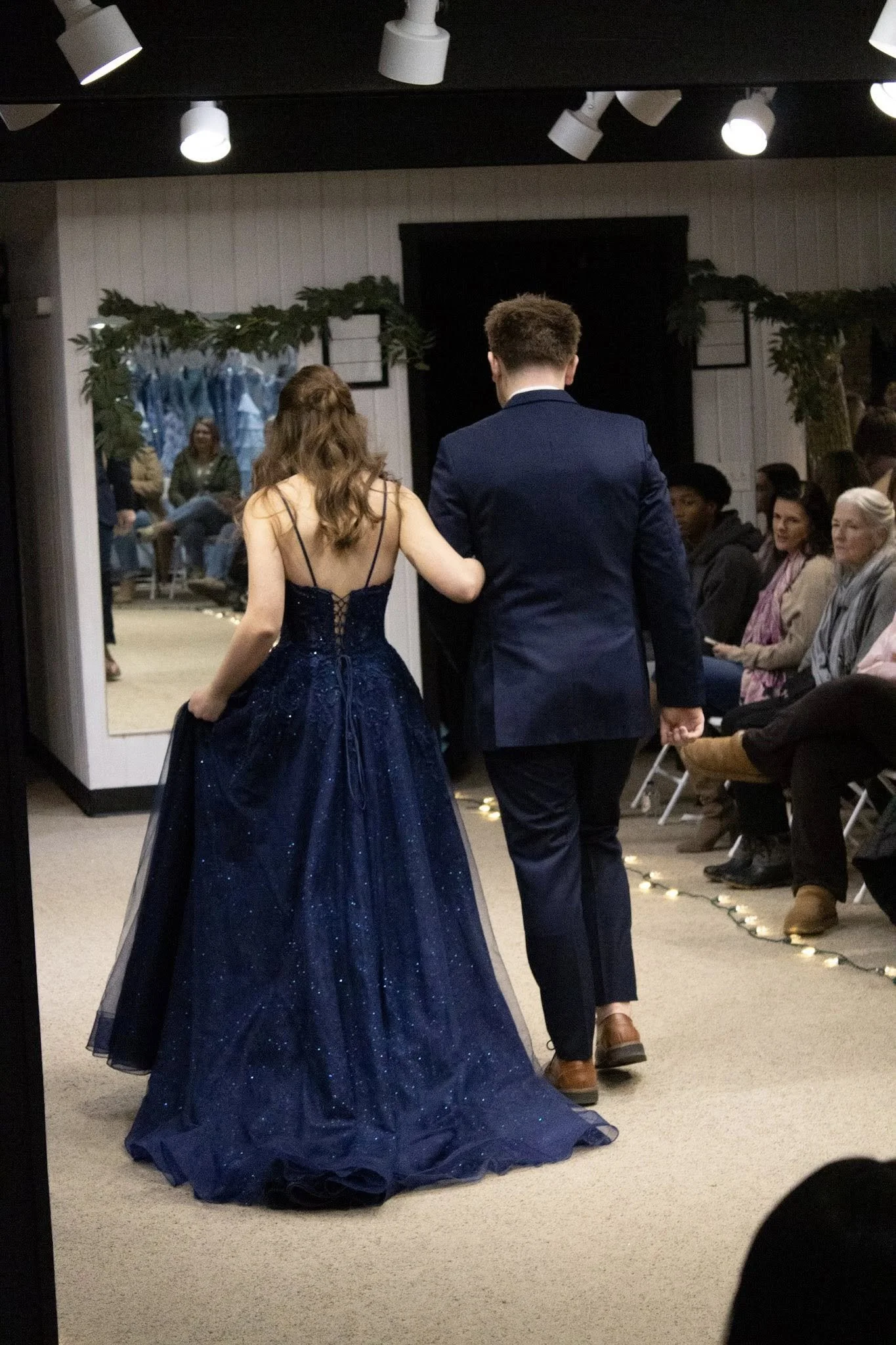 girls wearing prom dresses