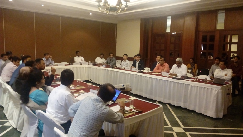 Ravi Krishnan, Managing Director (left) speaking at Roundtable in India.