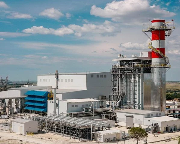Banner showing a combined-cycle power plant for the John Cockerill webinar titled 