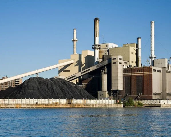 Banner showing a coal-fired power plant for the EES webinar titled 
