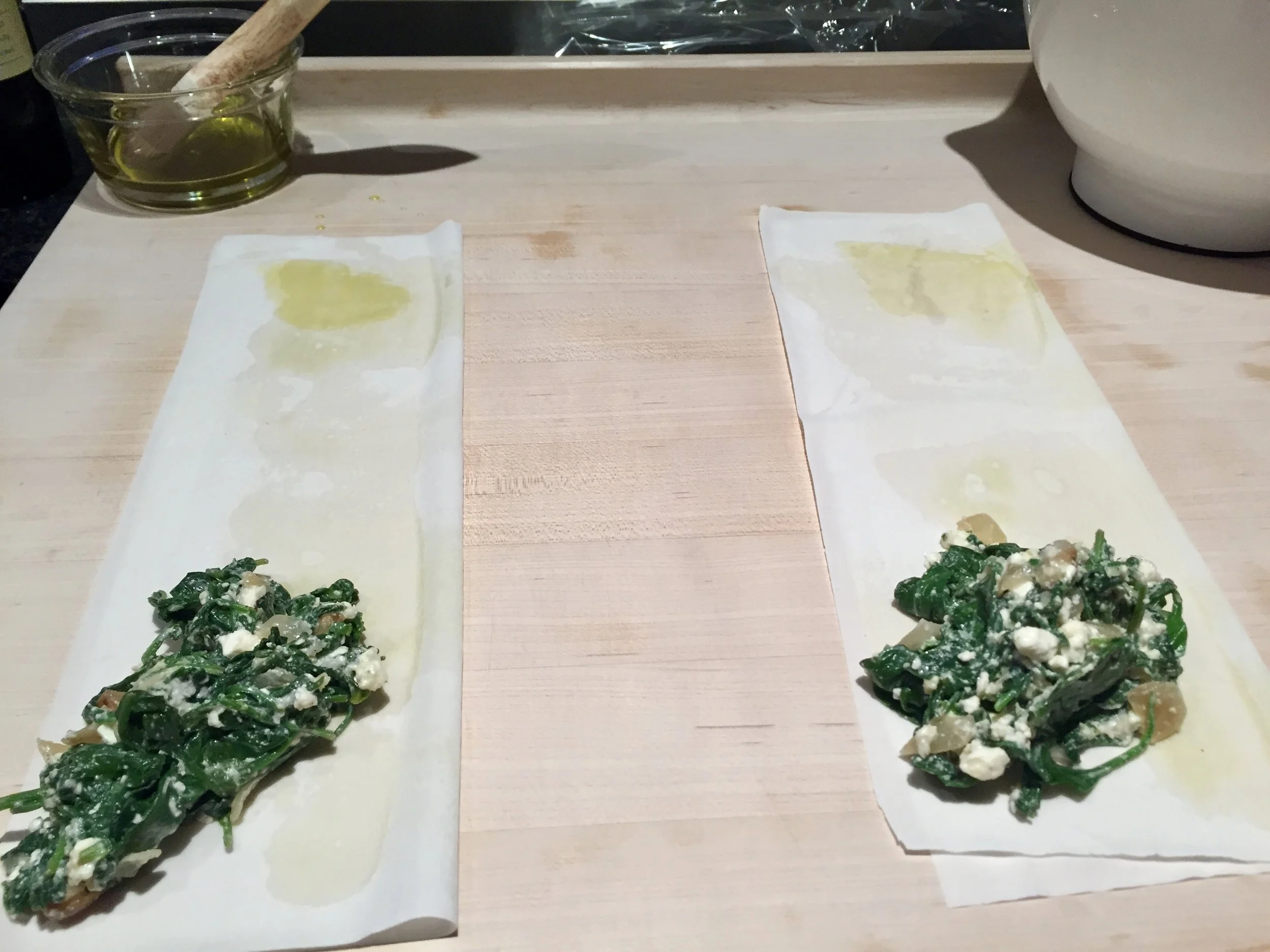 Place spoonful of spinach filling near the edge, in a triangular shape