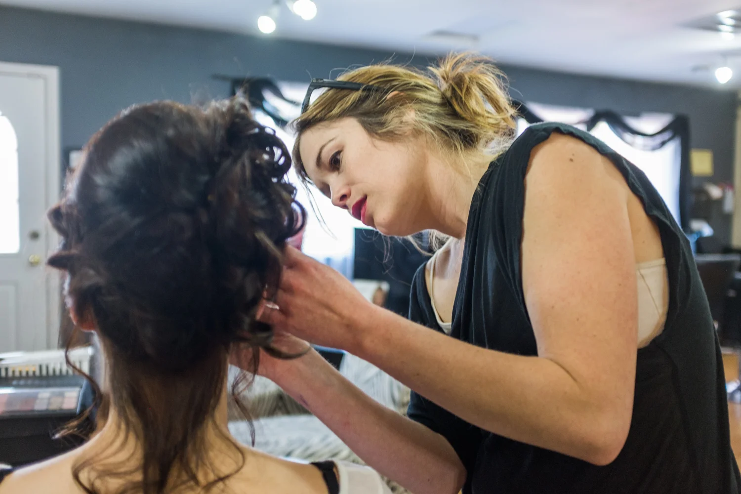 Dana doing hair and makeup with Mika.