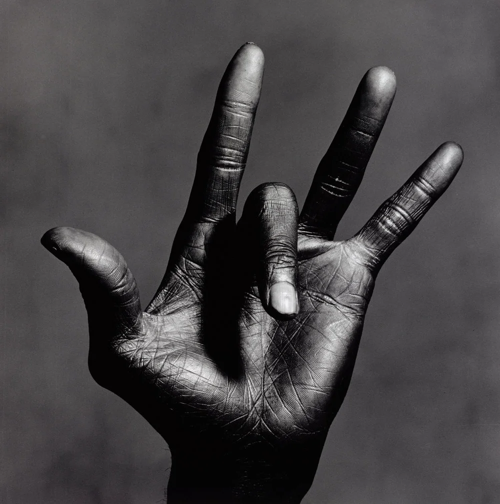 The hand of Miles Davis photographed by Irving Penn, 1986.