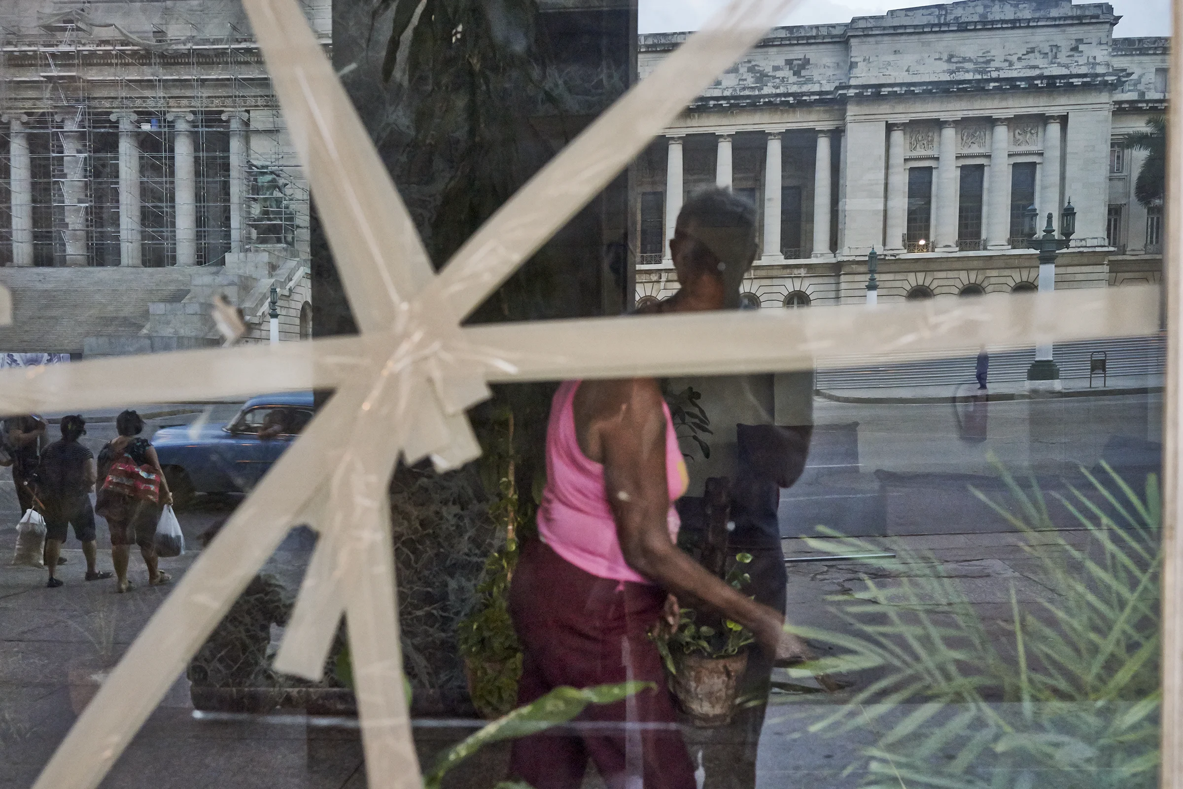 08 Cleaning woman broken window.jpg